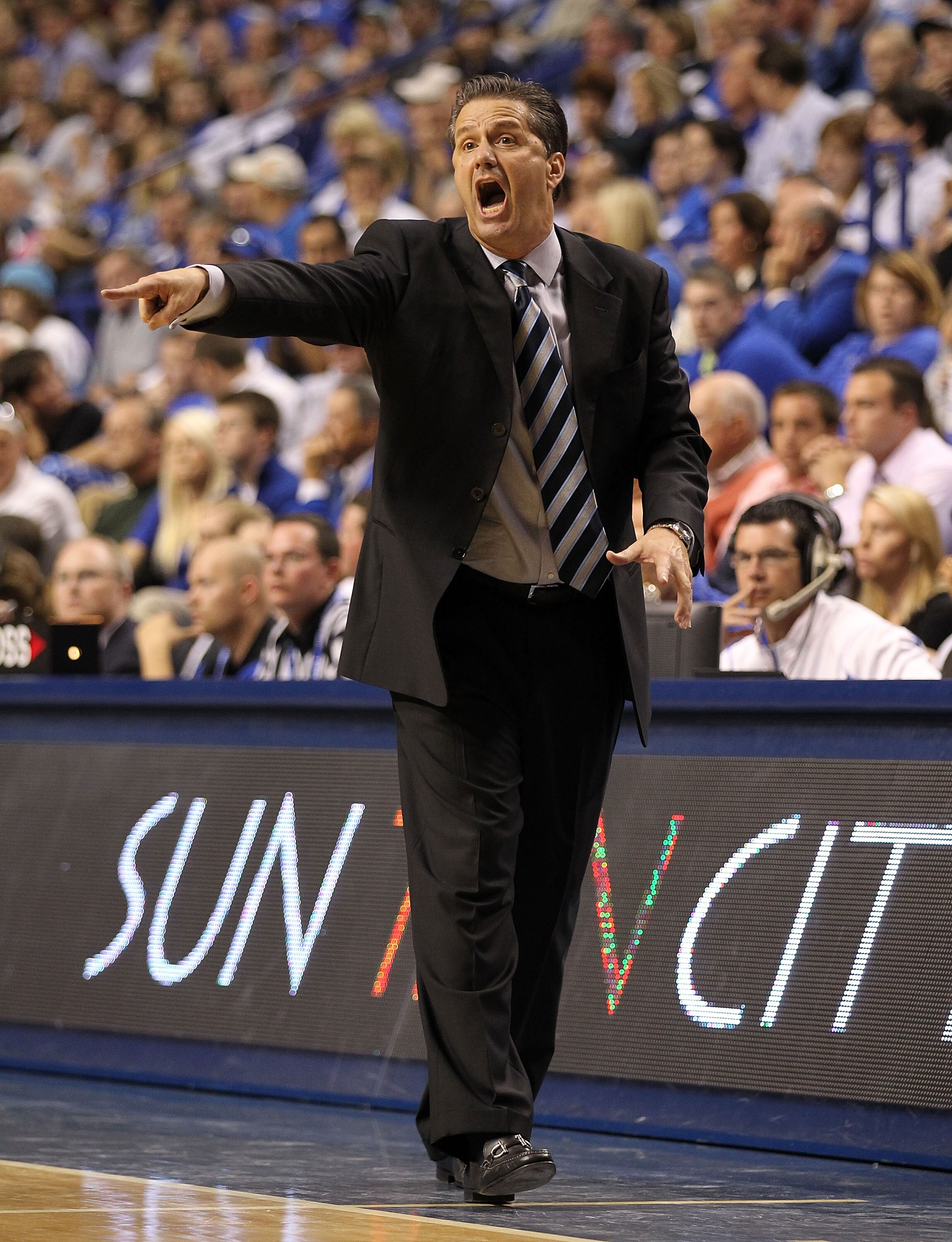 LEXINGTON, KY - NOVEMBER 12:  John Calipari the Head Coach of the Kentucky Wildcats gives   instructions to his team during the game against East Tennessee State Buccaneers at Rupp Arena on November 12, 2010 in Lexington, Kentucky.  (Photo by Andy Lyons/G