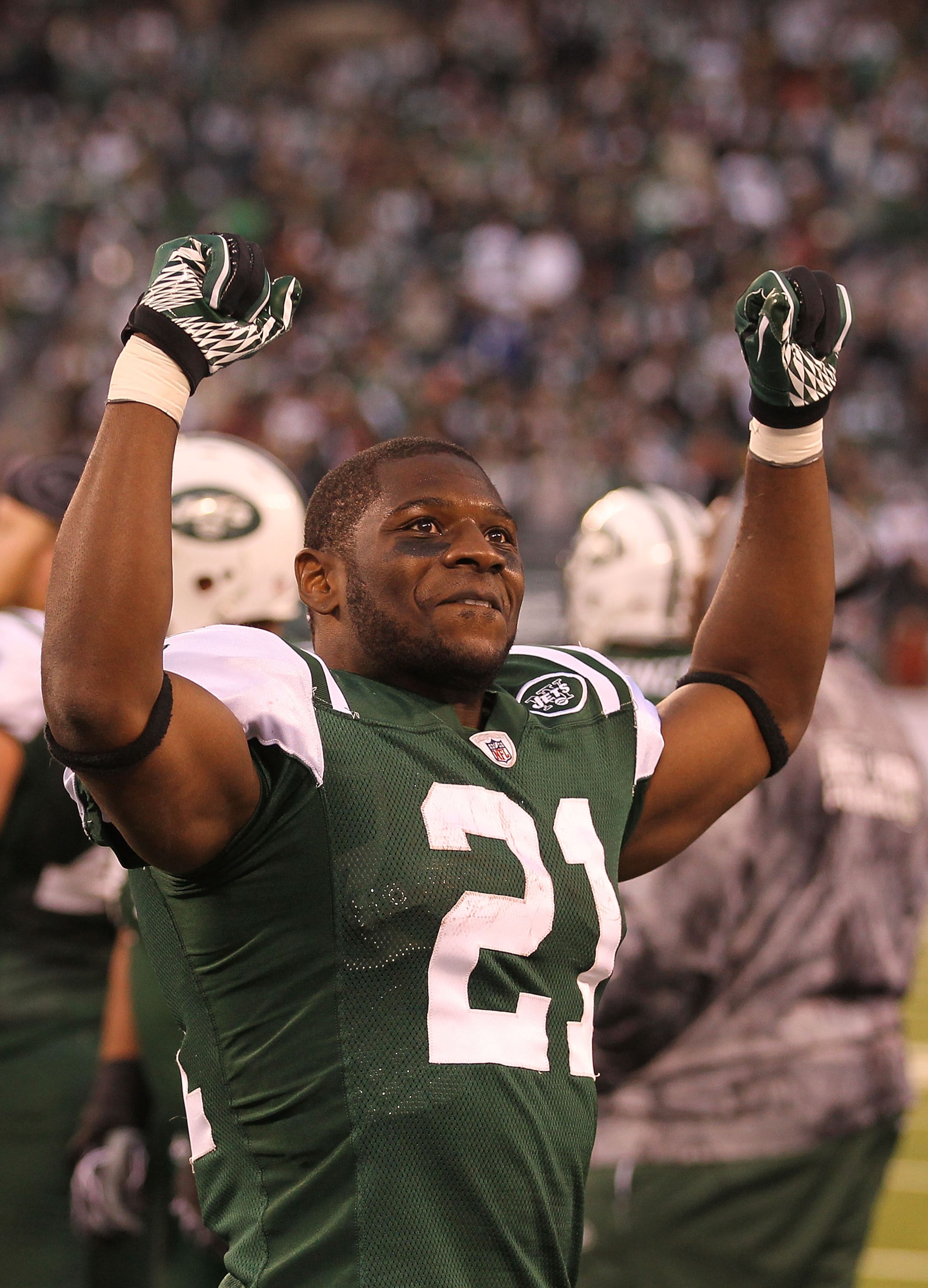 EAST RUTHERFORD, NJ - NOVEMBER 21:  LaDainian Tomlinson #21 of the New York Jets celebrates their 30-27 win against the Houston Texans during their  game on November 21, 2010 at the New Meadowlands Stadium  in East Rutherford, New Jersey.  (Photo by Al Be