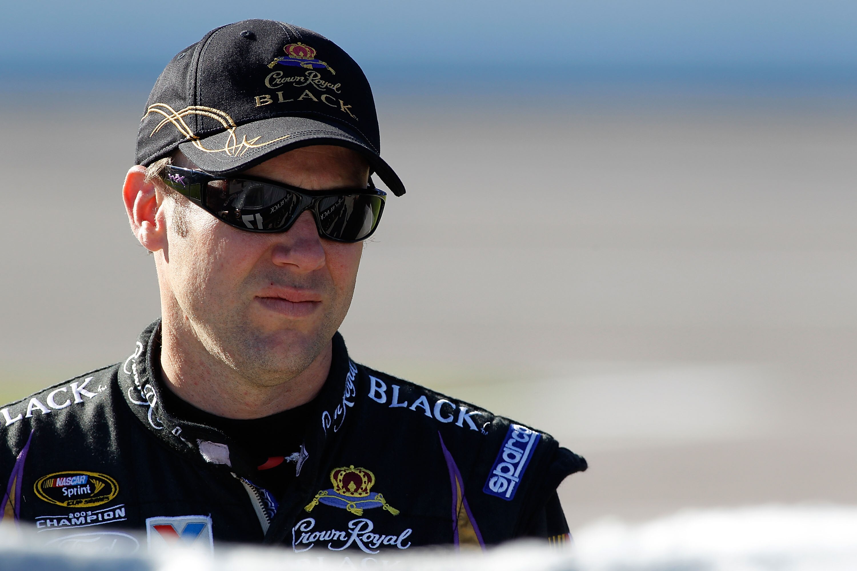 FORT WORTH, TX - NOVEMBER 05: Matt Kenseth, driver of the #17 Crown Royal Black Ford, stands on the grid during qualifying for the NASCAR Sprint Cup Series AAA Texas 500 at Texas Motor Speedway on November 5, 2010 in Fort Worth, Texas.  (Photo by Todd War