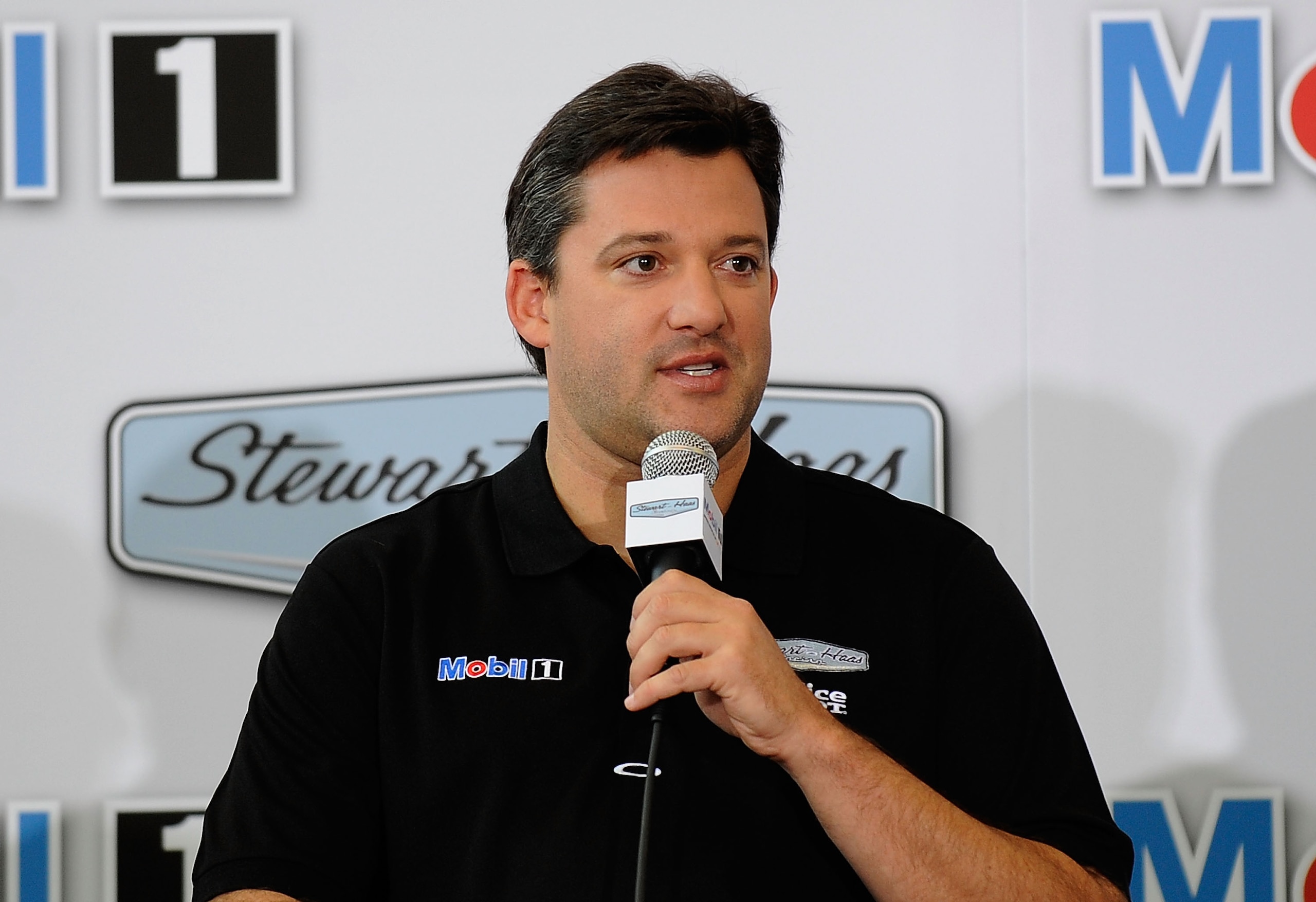 KANNAPOLIS, NC - OCTOBER 12: Tony Stewart, Stewart-Haas Racing's driver/owner, announced Mobil 1 as his co-primary sponsor with Office Depot beginning in 2011 at Stewart-Haas Racing on October 12, 2010 in Kannapolis, North Carolina. (Photo by Rusty Jarr KANNAPOLIS, NC - OCTOBER 12: Tony Stewart, Stewart-Haas Racing's driver/owner, announced Mobil 1 as his co-primary sponsor with Office Depot beginning in 2011 at Stewart-Haas Racing on October 12, 2010 in Kannapolis, North Carolina. (Photo by Rusty Jarr