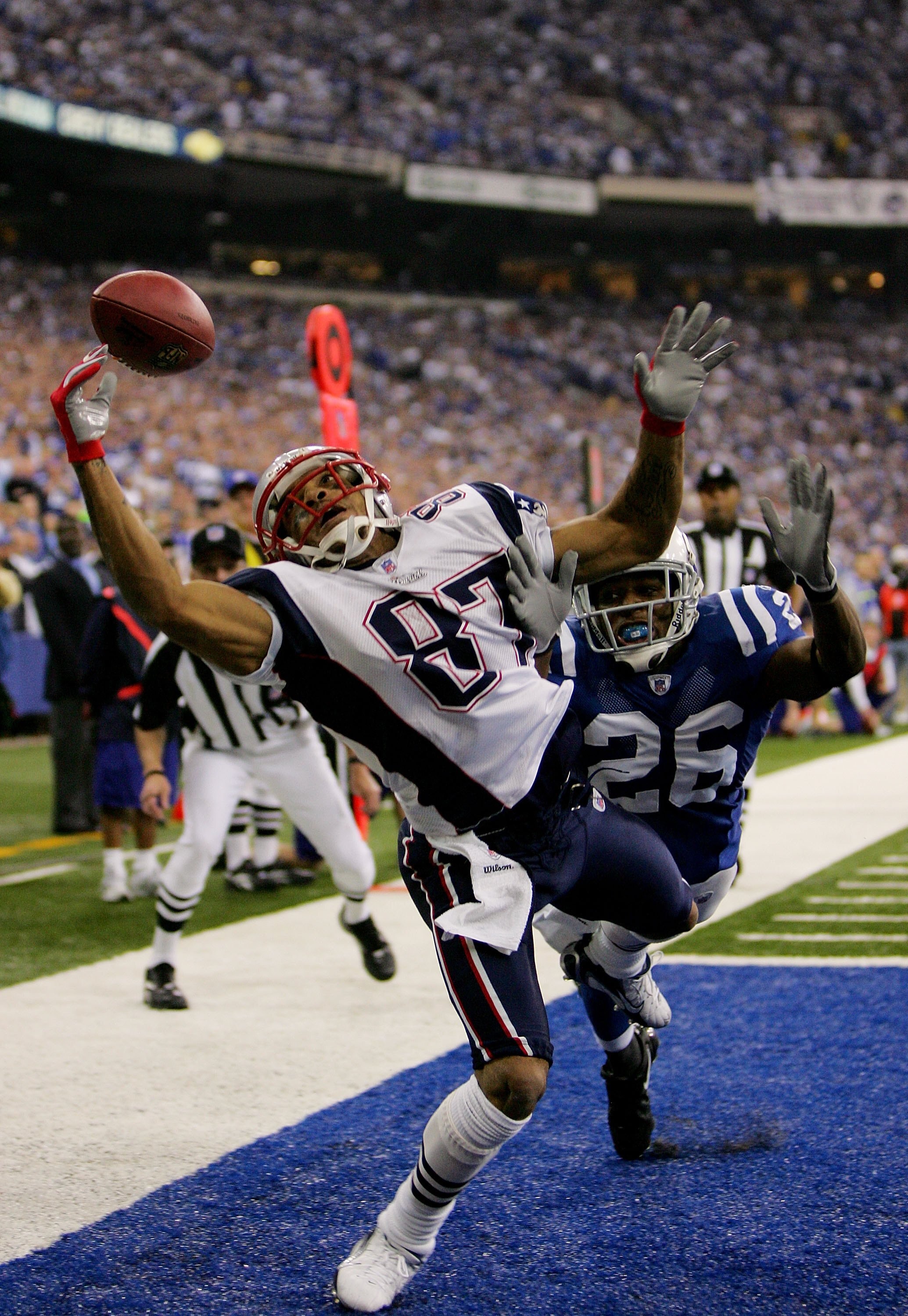 INDIANAPOLIS - JANUARY 21:  Reche Caldwell #87 of the New England Patriots cannot haul in this pass in front of Kelvin Hayden #26 of the Indianapolis Colts during the AFC Championship Game on January 21, 2007 at the RCA Dome in Indianapolis, Indiana.  (Ph