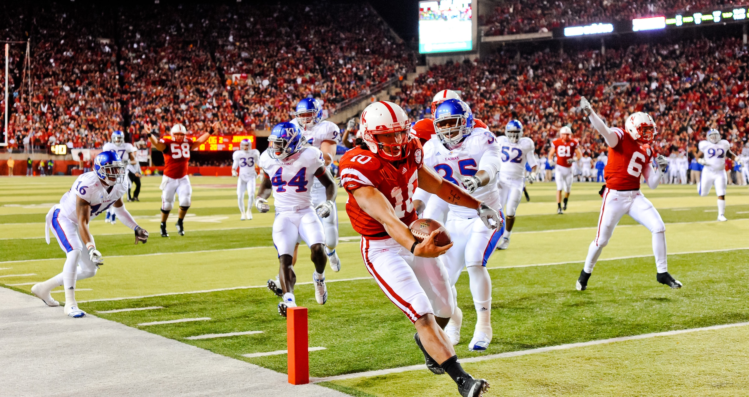 LINCOLN, NE - NOVEMBER 13: Roy Helu Jr. #10 of the Nebraska Cornhuskers runs for the endzone the Kansas Jayhawks during their game at Memorial Stadium on November 13, 2010 in Lincoln, Nebraska. Nebraska Defeated Kansas 20-3. (Photo by Eric Francis/Getty I