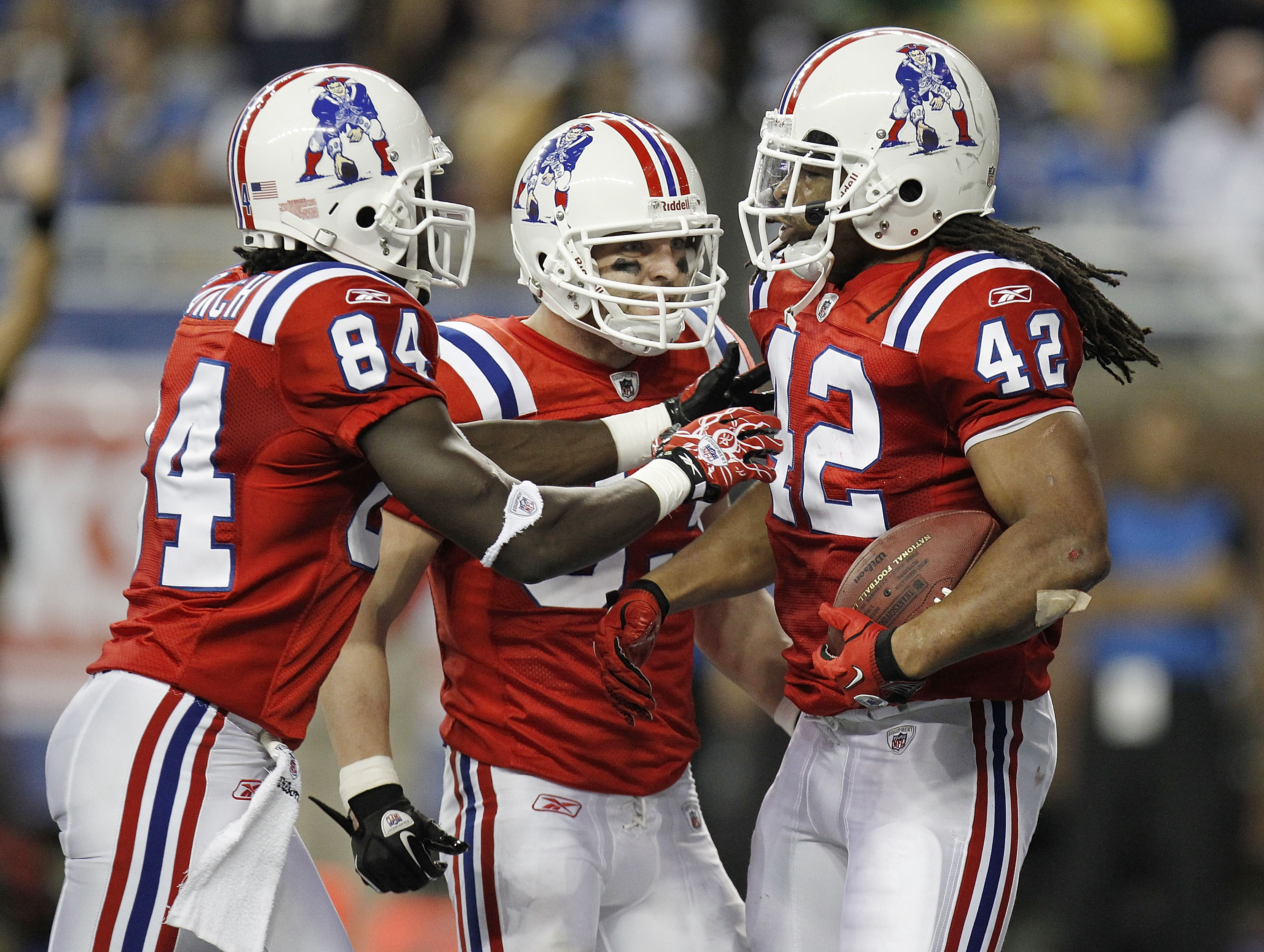 DETROIT - NOVEMBER 25:  BenJarvus Green-Ellis #42 of the New England Patriots celebrates a second quarter touchdown with Deion Branch #84 and Wes Walker #83 while playing the Detroit Lions on November 25, 2010 at Ford Field in Detroit, Michigan. New Engla