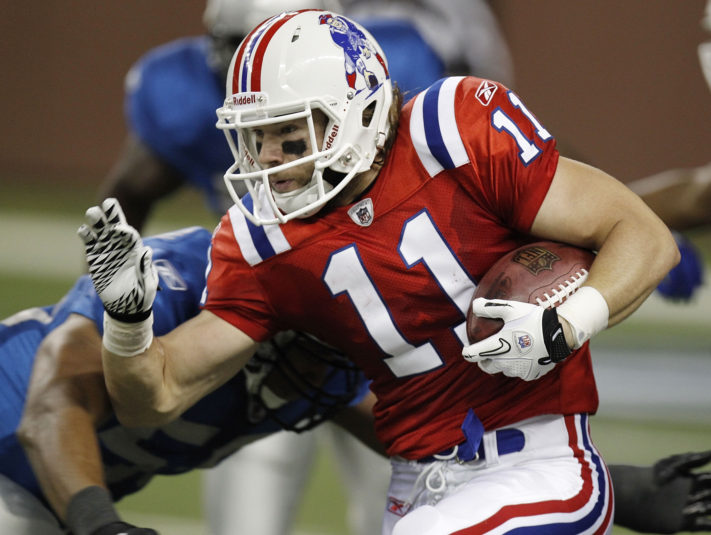 DETROIT - NOVEMBER 25:  Julian Edelman #11 of the New England Patriots returns a punt while playing the Detroit Lions on November 25, 2010 at Ford Field in Detroit, Michigan.  (Photo by Gregory Shamus/Getty Images)