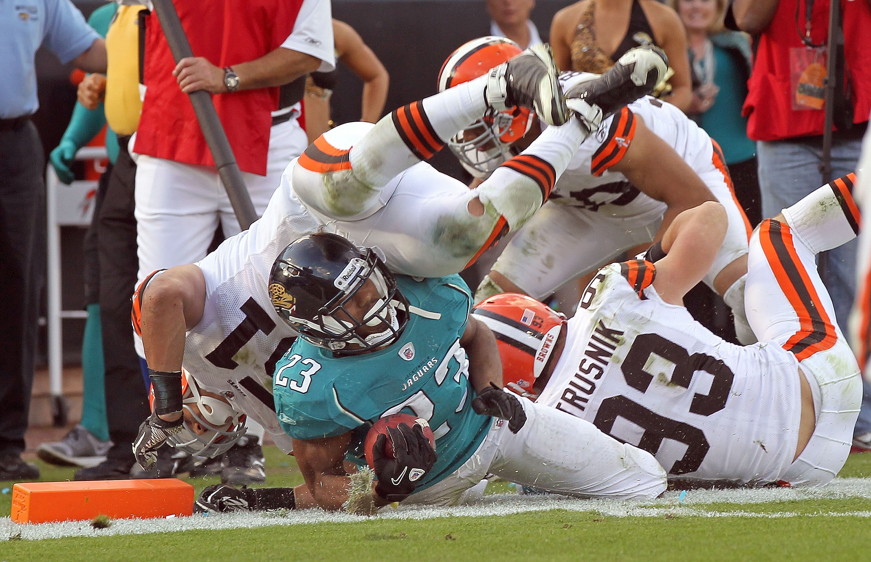 JACKSONVILLE, FL - NOVEMBER 21: Greg Jones #33 of the Jacksonville Jaguars is tackled at the one yard line during a game agaisnt the Cleveland Browns at EverBank Field on November 21, 2010 in Jacksonville, Florida.  (Photo by Mike Ehrmann/Getty Images)