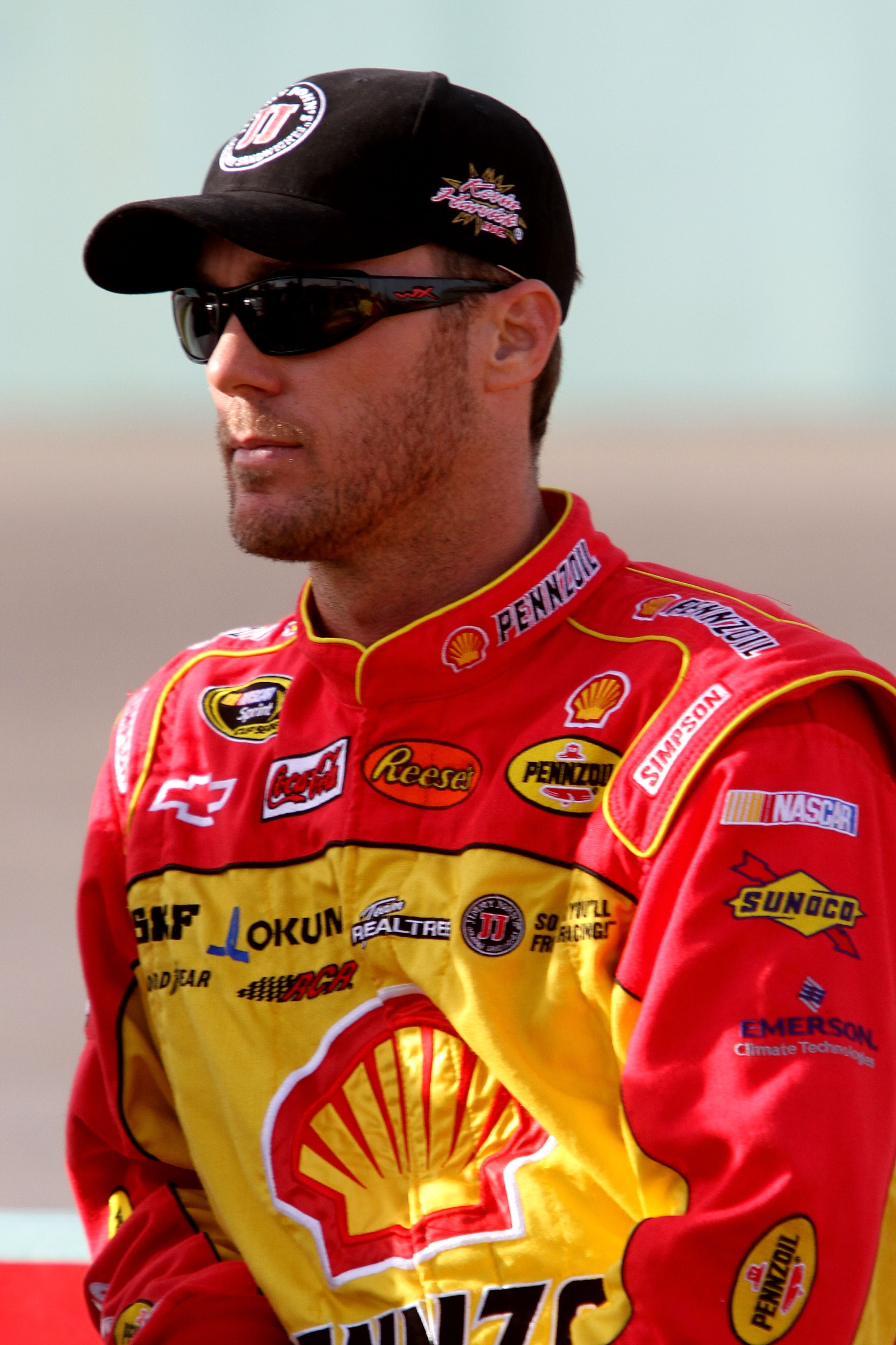 HOMESTEAD, FL - NOVEMBER 19:  Kevin Harvick, driver of the #29 Shell/Pennzoil Chevrolet, stands on the grid during qualifying for the NASCAR Sprint Cup Series Ford 400 at Homestead-Miami Speedway on November 19, 2010 in Homestead, Florida.  (Photo by Jerr