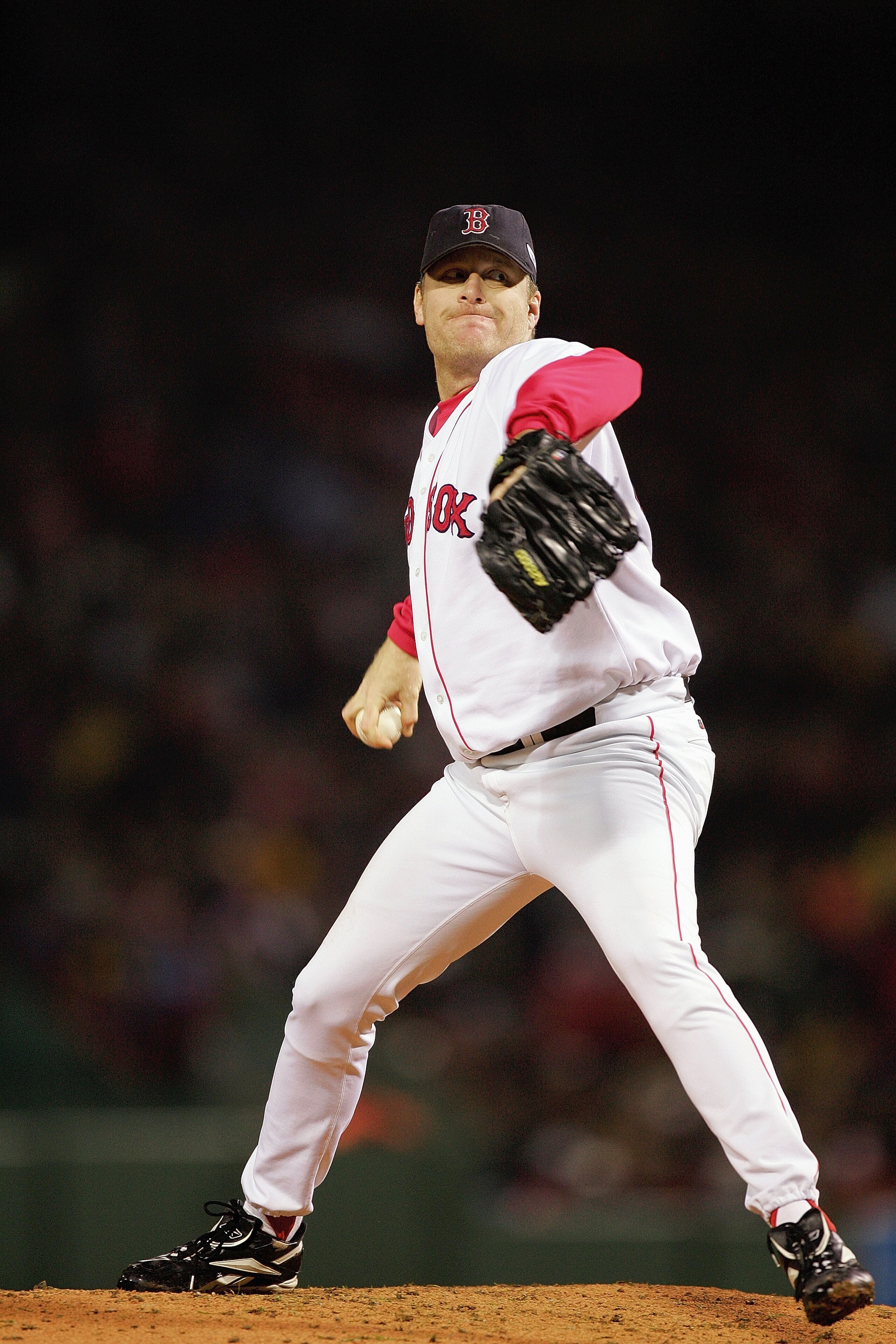 BOSTON - OCTOBER 24:  Curt Schilling #38 of the Boston Red Sox pitches against the St. Louis Cardinals during game two of the 2004 World Series on October 24, 2004 at Fenway Park in Boston, Massachusetts. (Photo by Ezra Shaw/Getty Images)