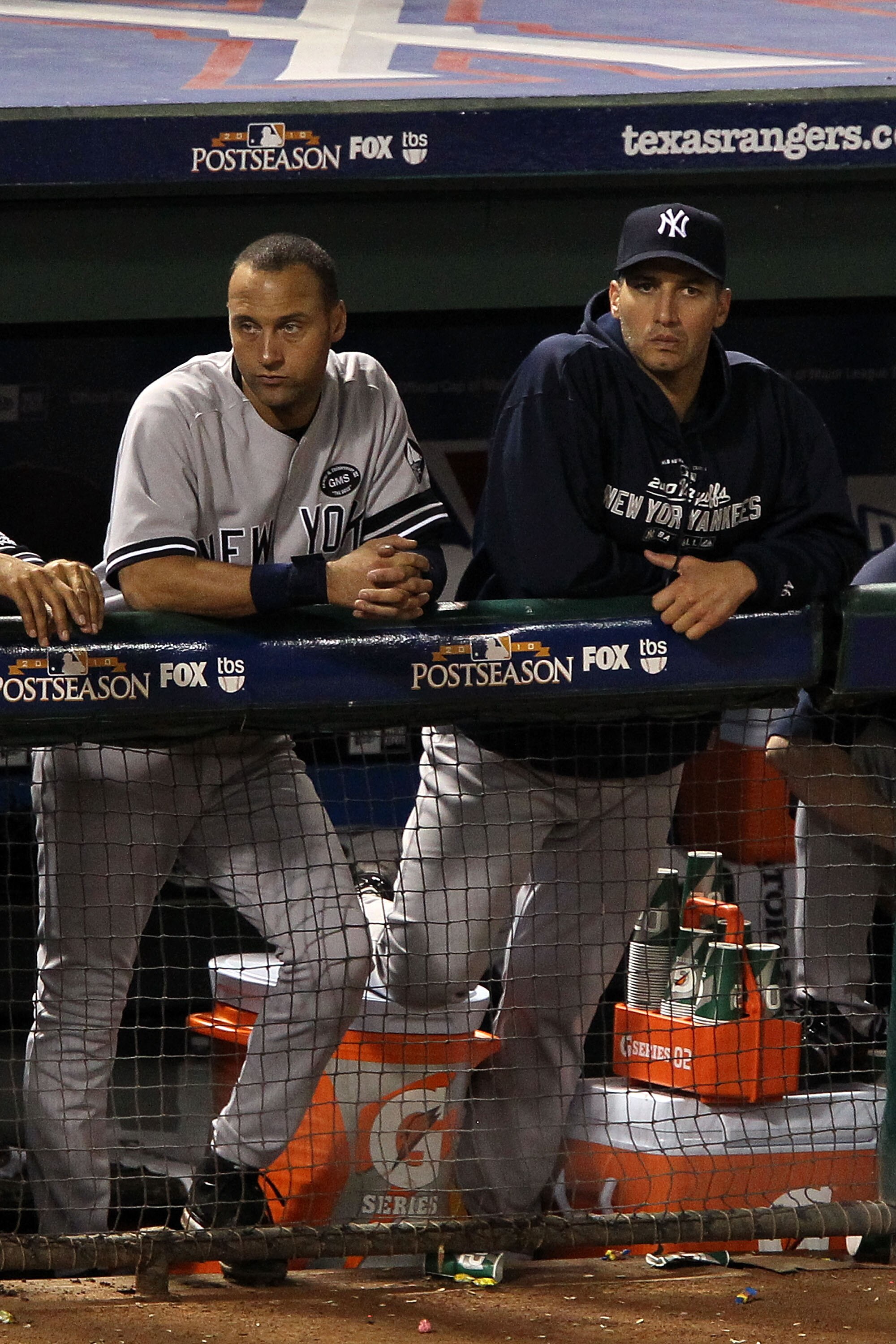 ARLINGTON, TX - OCTOBER 22: Derek Jeter #2 and Andy Pettitte #46 of the New York Yankees look on from the dugout in Game Six of the ALCS against the Texas Rangers during the 2010 MLB Playoffs at Rangers Ballpark in Arlington on October 22, 2010 in Arling ARLINGTON, TX - OCTOBER 22: Derek Jeter #2 and Andy Pettitte #46 of the New York Yankees look on from the dugout in Game Six of the ALCS against the Texas Rangers during the 2010 MLB Playoffs at Rangers Ballpark in Arlington on October 22, 2010 in Arling