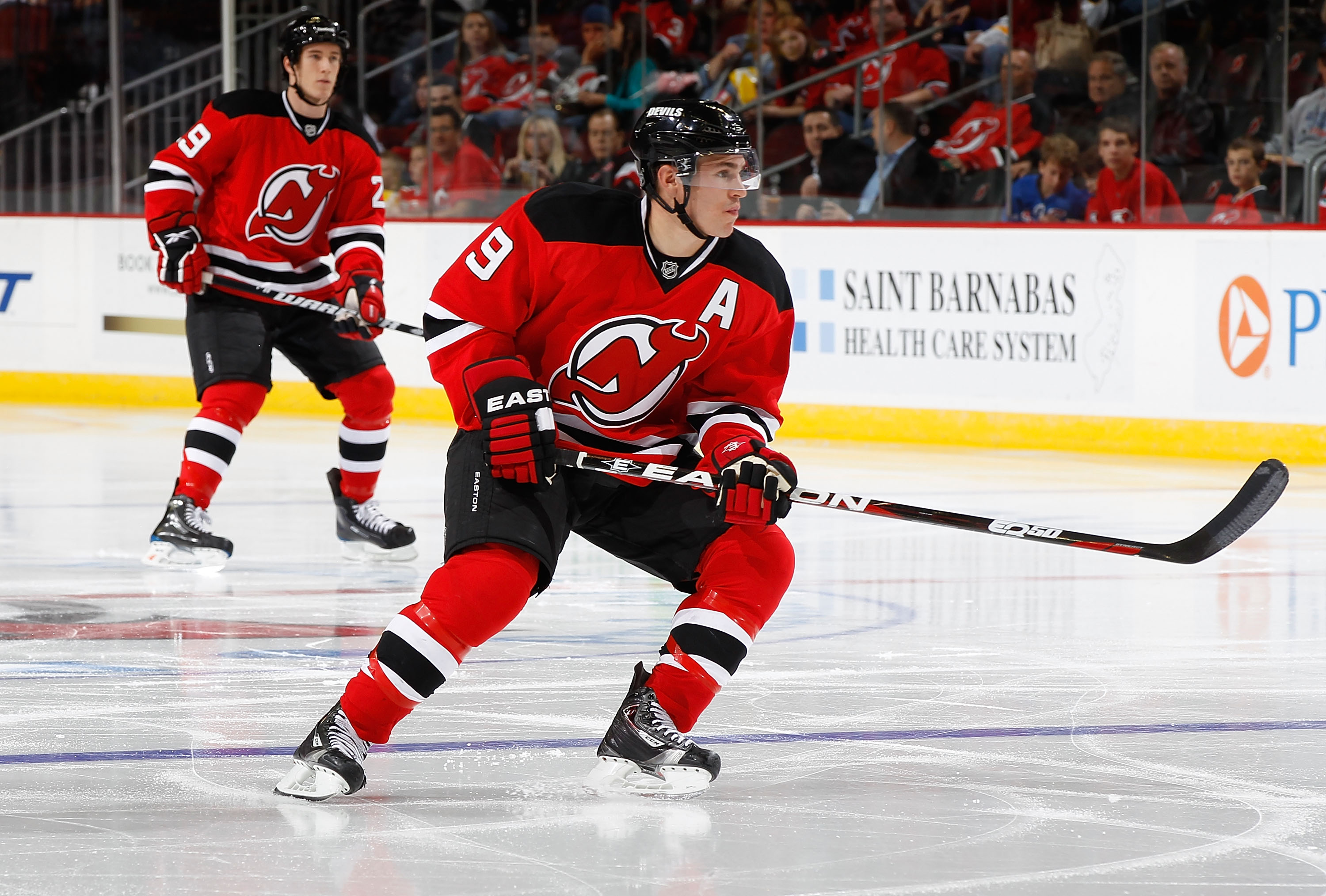 NEWARK, NJ - OCTOBER 23:  Zach Parise #9 of the New Jersey Devils skates against the Buffalo Sabres on October 23, 2010 at the Prudential Center in Newark, New Jersey. Sabres defeated the Devils 6-1.  (Photo by Mike Stobe/Getty Images)