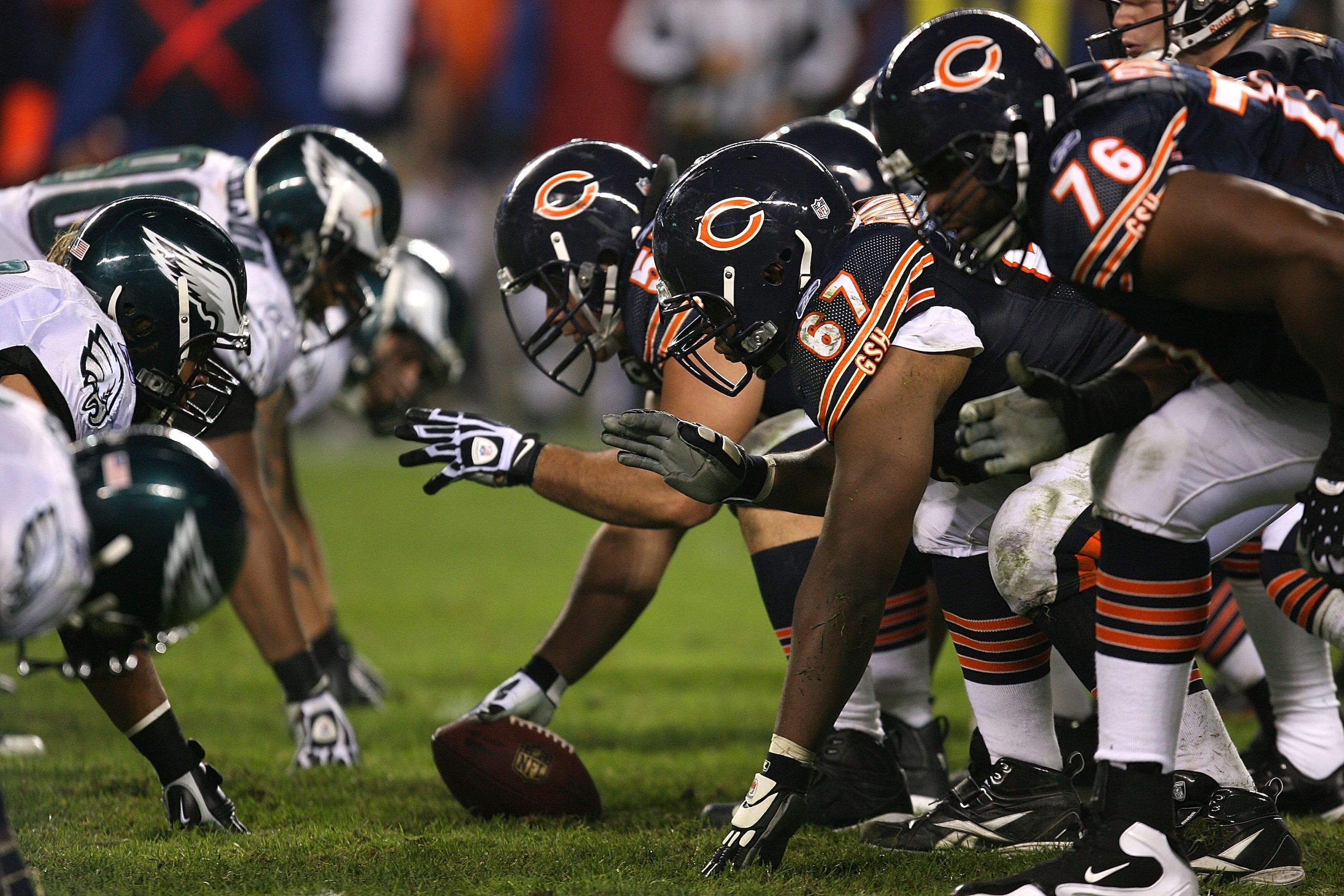 CHICAGO - NOVEMBER 22: Members of the Chicago Bear offense line up against the defense of the Philadelphia Eagles at Soldier Field on November 22, 2009 in Chicago, Illinois. The Eagles defeated the Bears 24-20. (Photo by Jonathan Daniel/Getty Images)