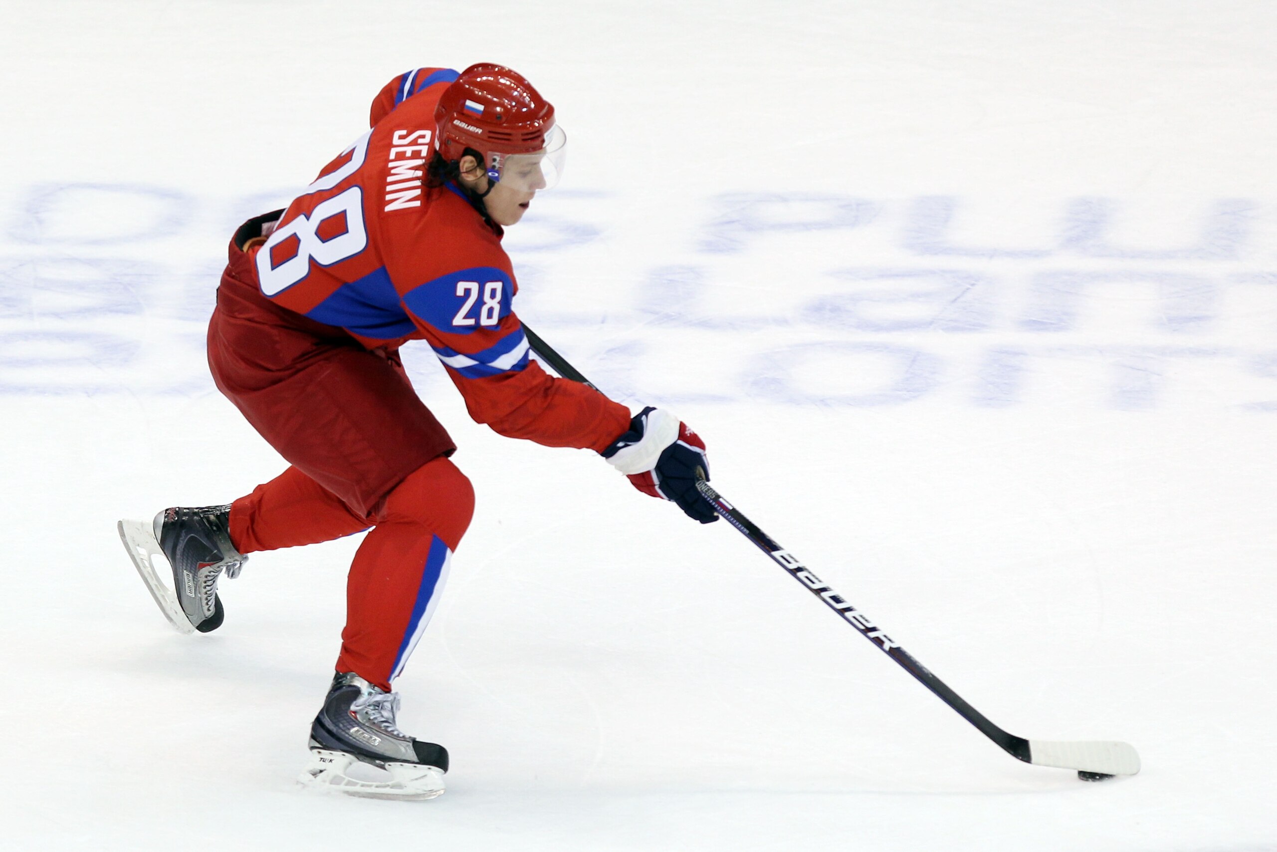 VANCOUVER, BC - FEBRUARY 24:  Alexander Semin #28 of Russia moves the puck against Canada during the ice hockey men's quarter final game between Russia and Canada on day 13 of the Vancouver 2010 Winter Olympics at Canada Hockey Place on February 24, 2010