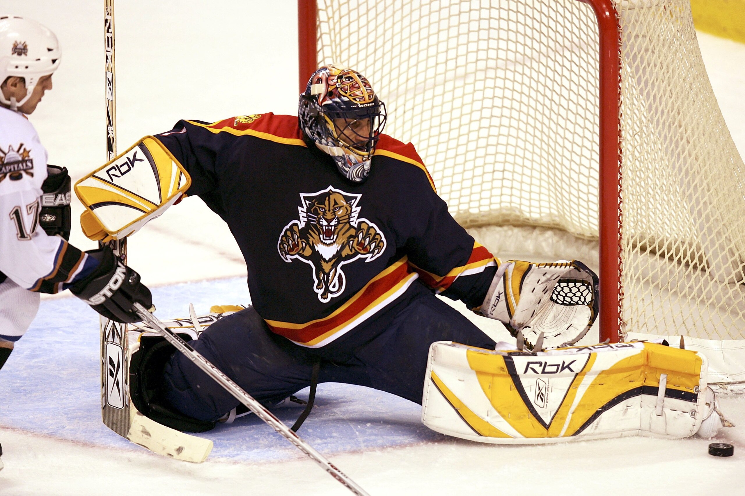 SUNRISE, FL - MARCH 22:  Goaltender Robert Luongo #1 of the Florida Panthers makes a save on shot attempt by Chris Clark #17 in the third period on March 22, 2006 at Bank Atlantic Center in Sunrise, Florida.  (Photo by Doug Benc/Getty Images)