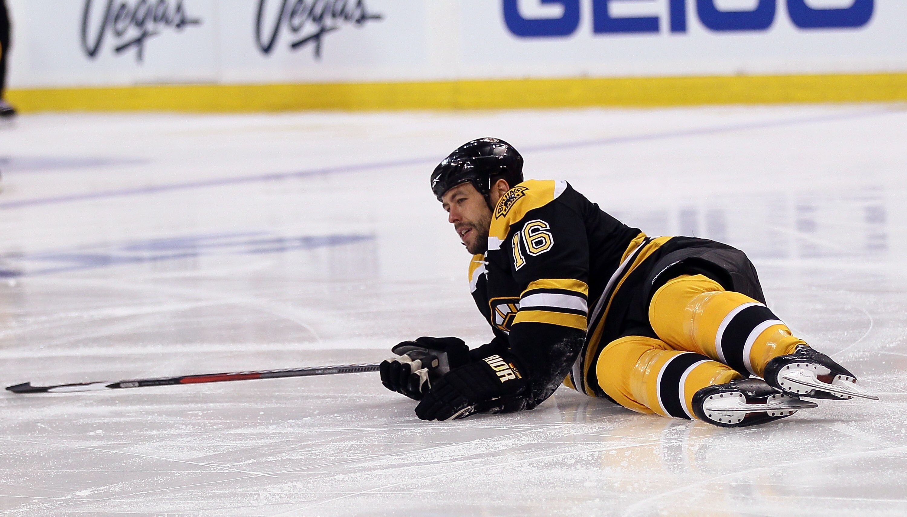 BOSTON - MAY 01:  Marco Sturm #16 of the Boston Bruins lies on the ice after a hit in the first period agianst the Philadelphia Flyers in Game One of the Eastern Conference Semifinals during the 2010 NHL Stanley Cup Playoffs at TD Garden on May 1, 2010 in