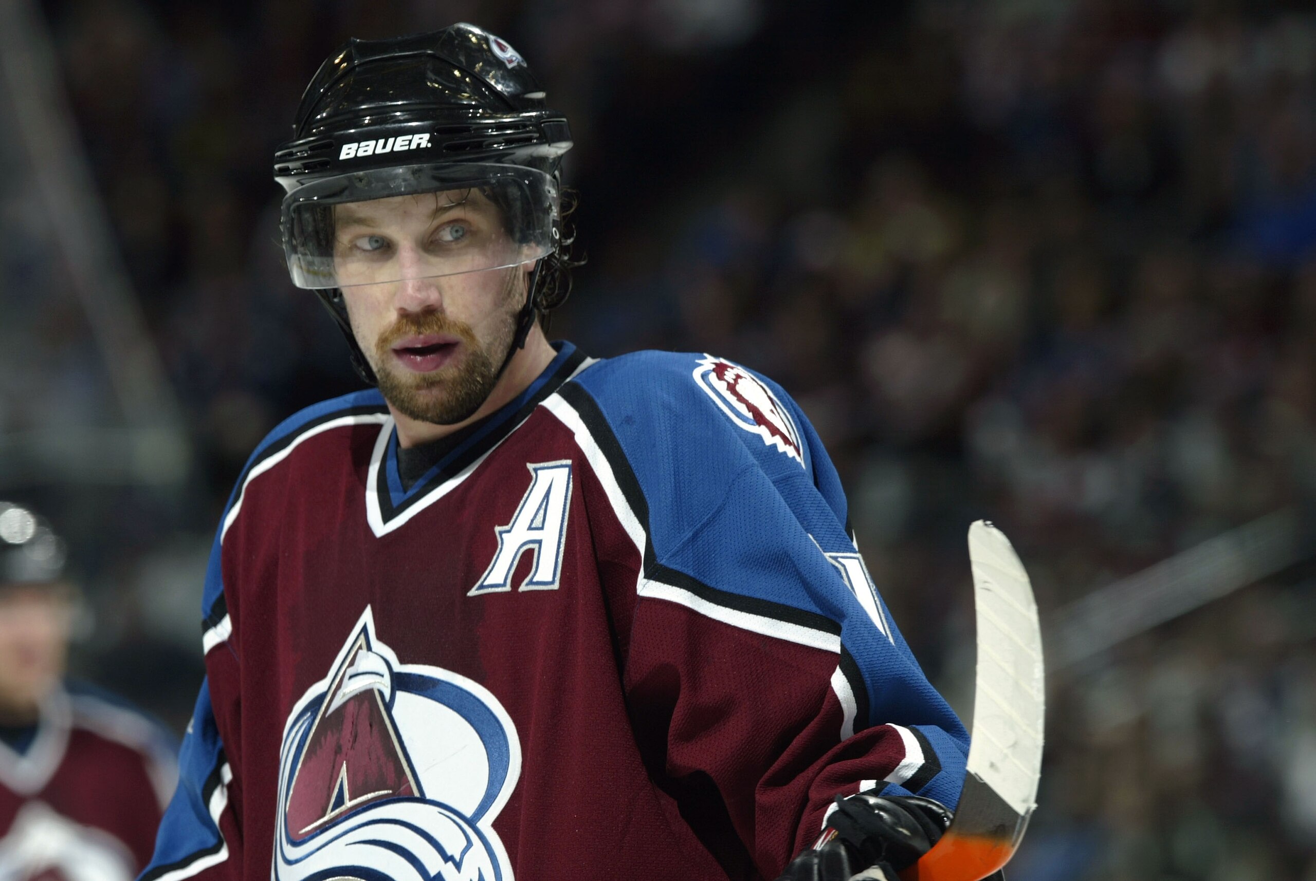 DENVER - MARCH 23:  Peter Forsberg #21 of the Colorado Avalanche waits for the puck to drop on a face-off against the Chicago Blackhawks March 23, 2004 at the Pepsi Center in Denver, Colorado.  The  teams tied 2-2.   (Photo by Brian Bahr/Getty Images)