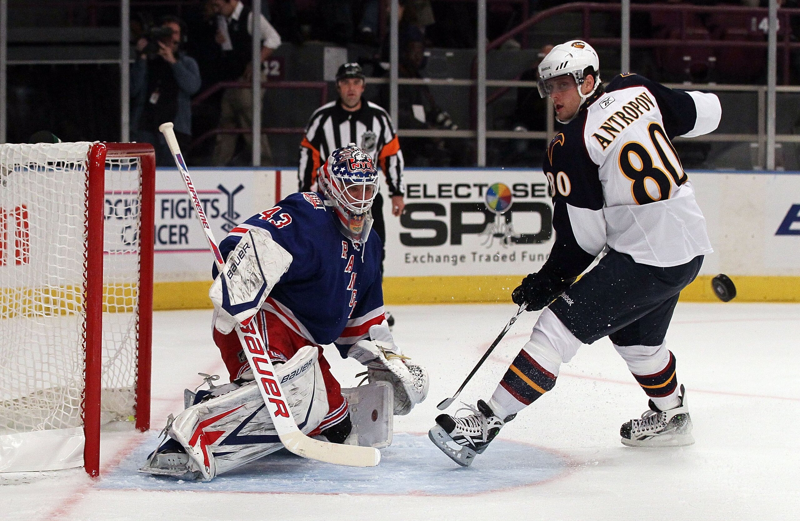 NEW YORK - OCTOBER 27:  Nik Antropov #80 of the Atlanta Thrashers skates against Martin Biron #43 of the New York Rangers on October 27, 2010 at Madison Square Garden in New York City.  (Photo by Jim McIsaac/Getty Images)