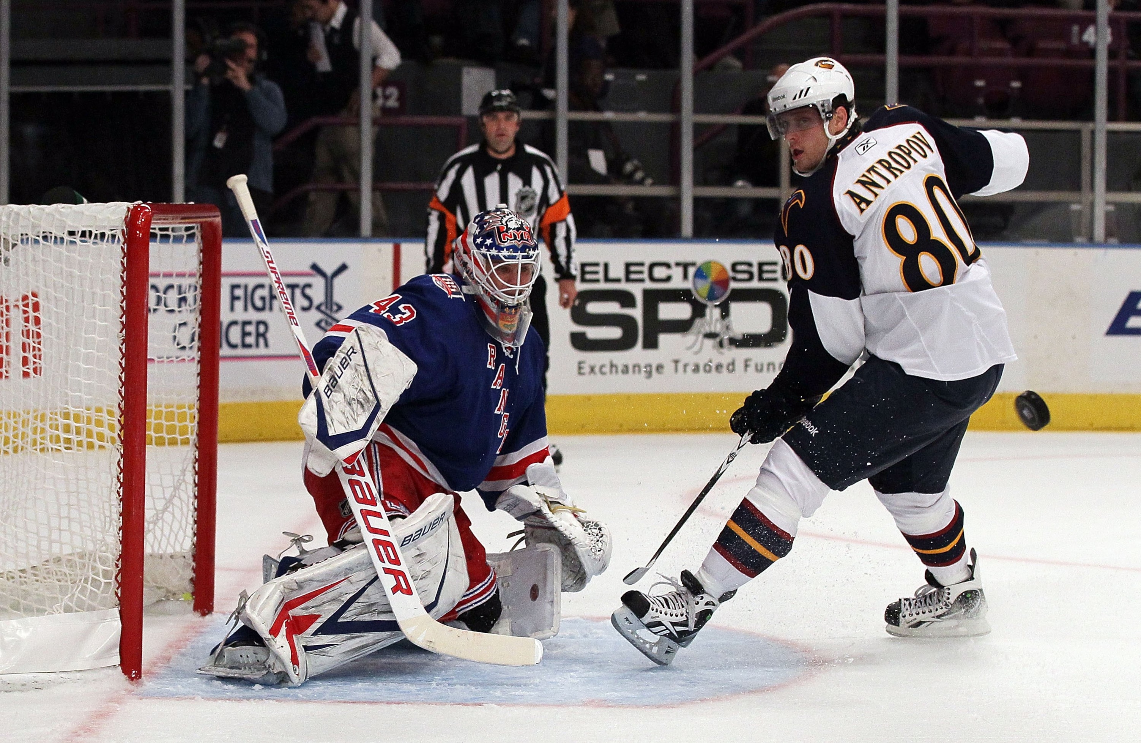 NEW YORK - OCTOBER 27:  Nik Antropov #80 of the Atlanta Thrashers skates against Martin Biron #43 of the New York Rangers on October 27, 2010 at Madison Square Garden in New York City.  (Photo by Jim McIsaac/Getty Images)