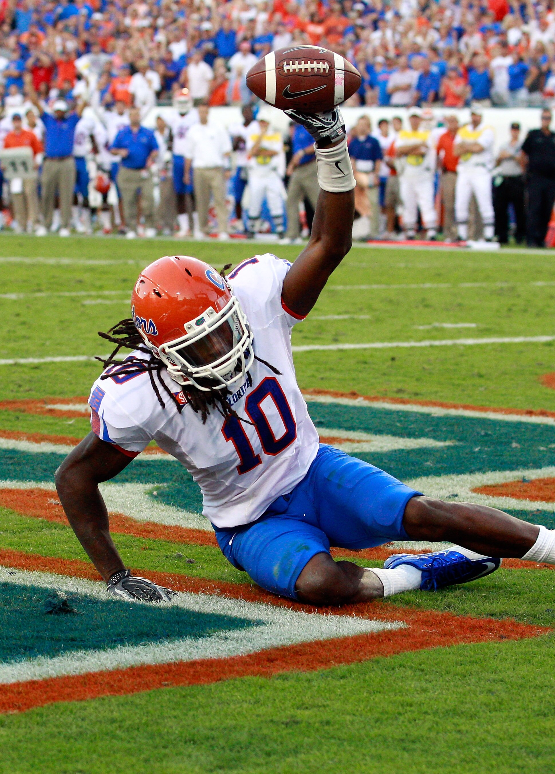 JACKSONVILLE, FL - OCTOBER 30:  Will Hill #10 of the Florida Gators holds up the ball after an interception during the game against the Georgia Bulldogs at EverBank Field on October 30, 2010 in Jacksonville, Florida.  (Photo by Sam Greenwood/Getty Images)