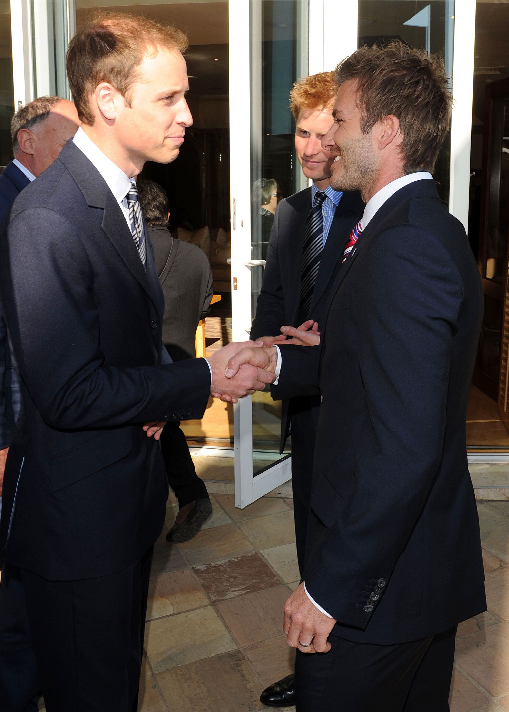 JOHANNESBERG, SOUTH AFRICA - JUNE 19:  Prince William greets David Beckham (R) at an FA reception at the Saxon Hotel on June 19, 2010 in Johannesberg, South Africa. (Photo by Luca Ghidoni - Pool/Getty Images)