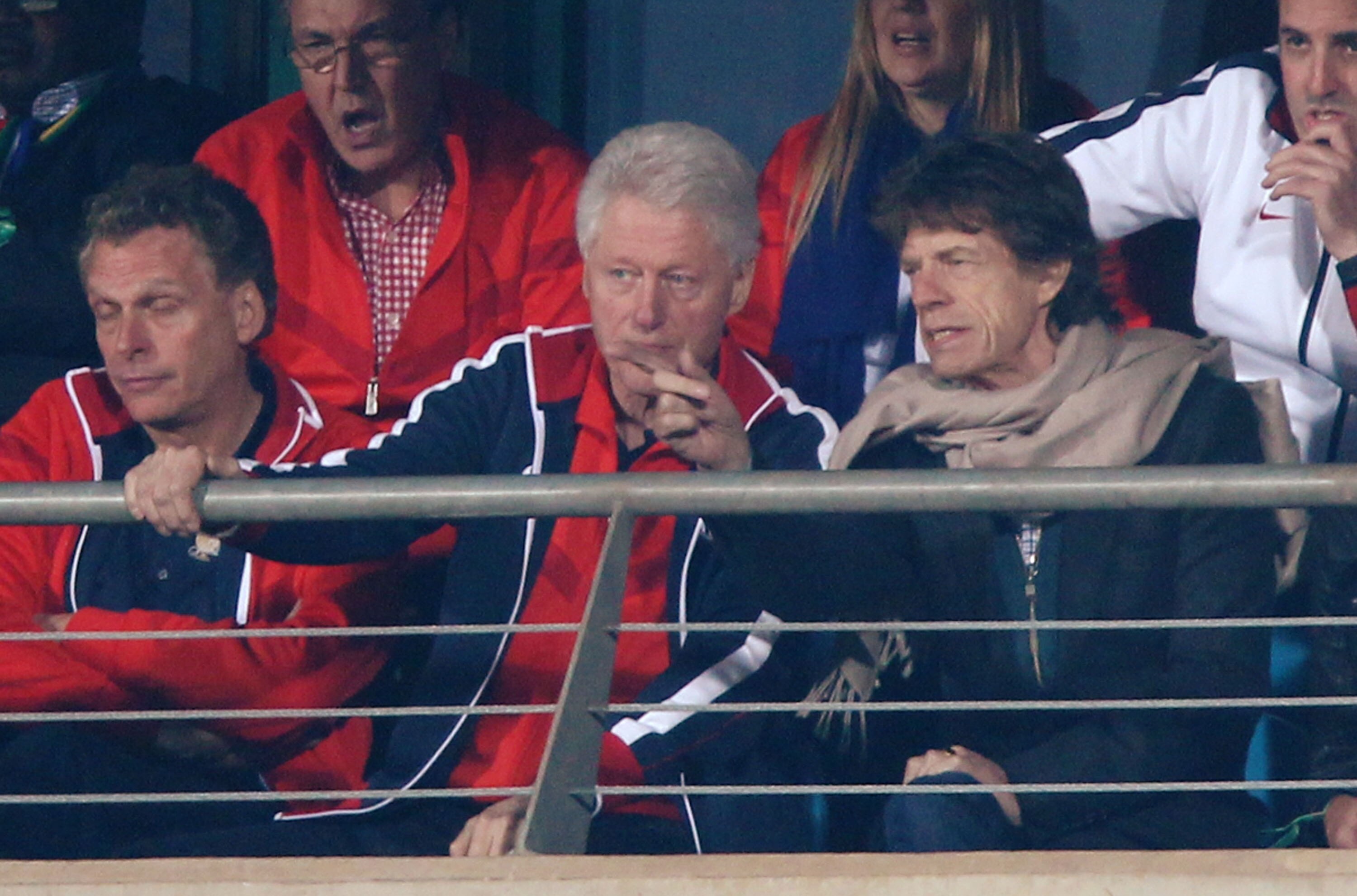 RUSTENBURG, SOUTH AFRICA - JUNE 26:  Former US President Bill Clinton and Mick Jagger attend the 2010 FIFA World Cup South Africa Round of Sixteen match between USA and Ghana at Royal Bafokeng Stadium on June 26, 2010 in Rustenburg, South Africa.  (Photo