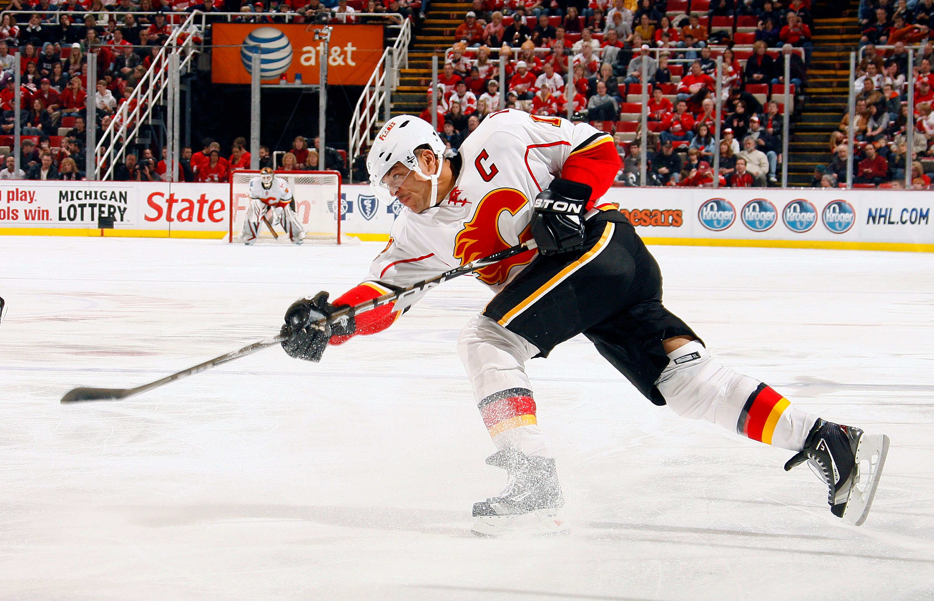 DETROIT - NOVEMBER 21:  Jarome Iginla #12 of the Calgary Flames takes a slap shot against the Detroit Red Wings during their NHL game at Joe Louis Arena on November 21, 2010 in Detroit, Michigan. (Photo By Dave Sandford/Getty Images)