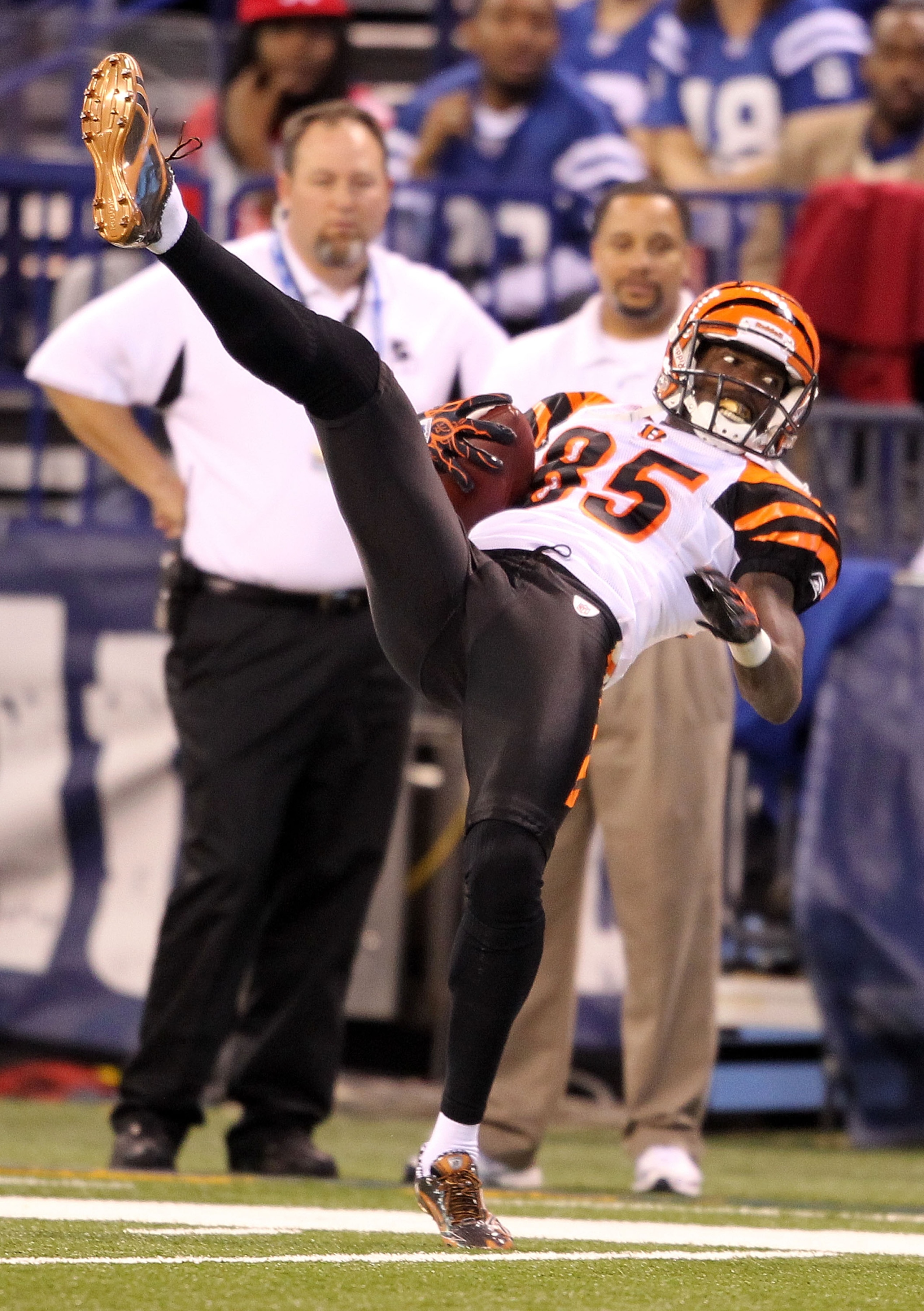 INDIANAPOLIS - NOVEMBER 14:  Chad Ochocinco #85 of the Cincinnati Bengals reaches for a pass during the Bengals 23-17 loss to the Indianapolis Colts in the NFL game at Lucas Oil Stadium on November 14, 2010 in Indianapolis, Indiana.  (Photo by Andy Lyons/