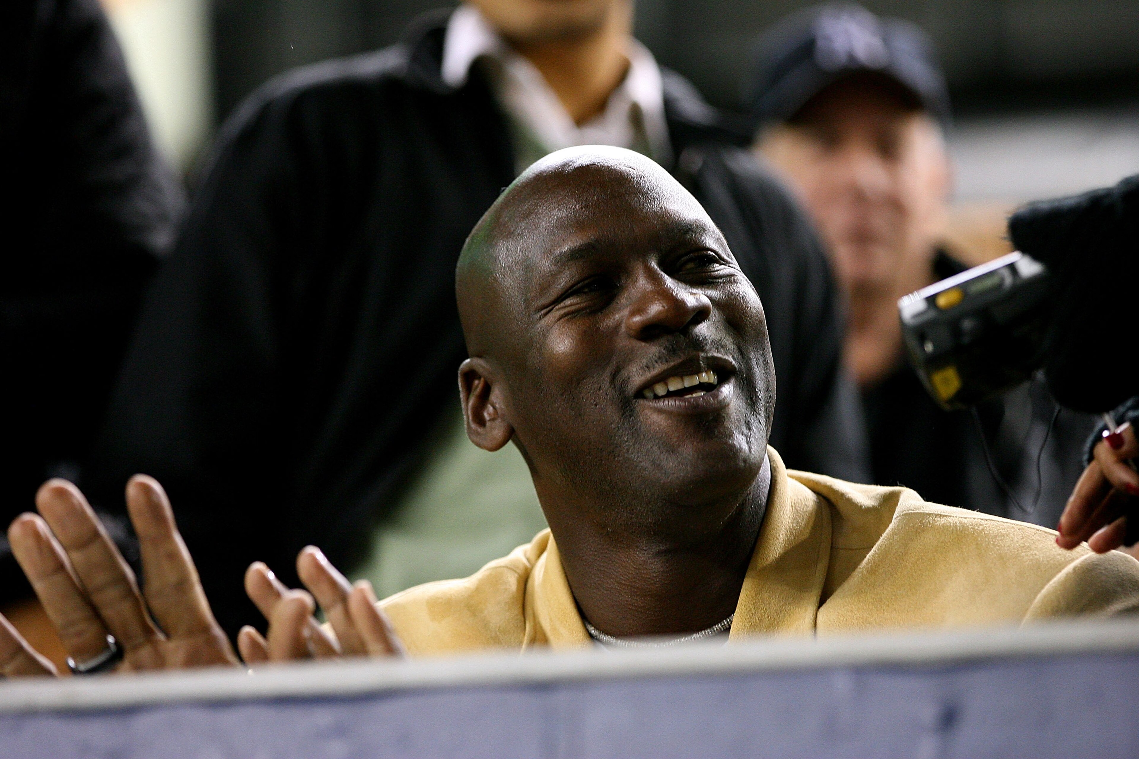 NEW YORK - OCTOBER 19: Basketball Hall of Famer Michael Jordan sits in the stands during Game Four of the ALCS during the 2010 MLB Playoffs at Yankee Stadium on October 19, 2010 in the Bronx borough of New York City. (Photo by Andrew Burton/Getty Images NEW YORK - OCTOBER 19: Basketball Hall of Famer Michael Jordan sits in the stands during Game Four of the ALCS during the 2010 MLB Playoffs at Yankee Stadium on October 19, 2010 in the Bronx borough of New York City. (Photo by Andrew Burton/Getty Images