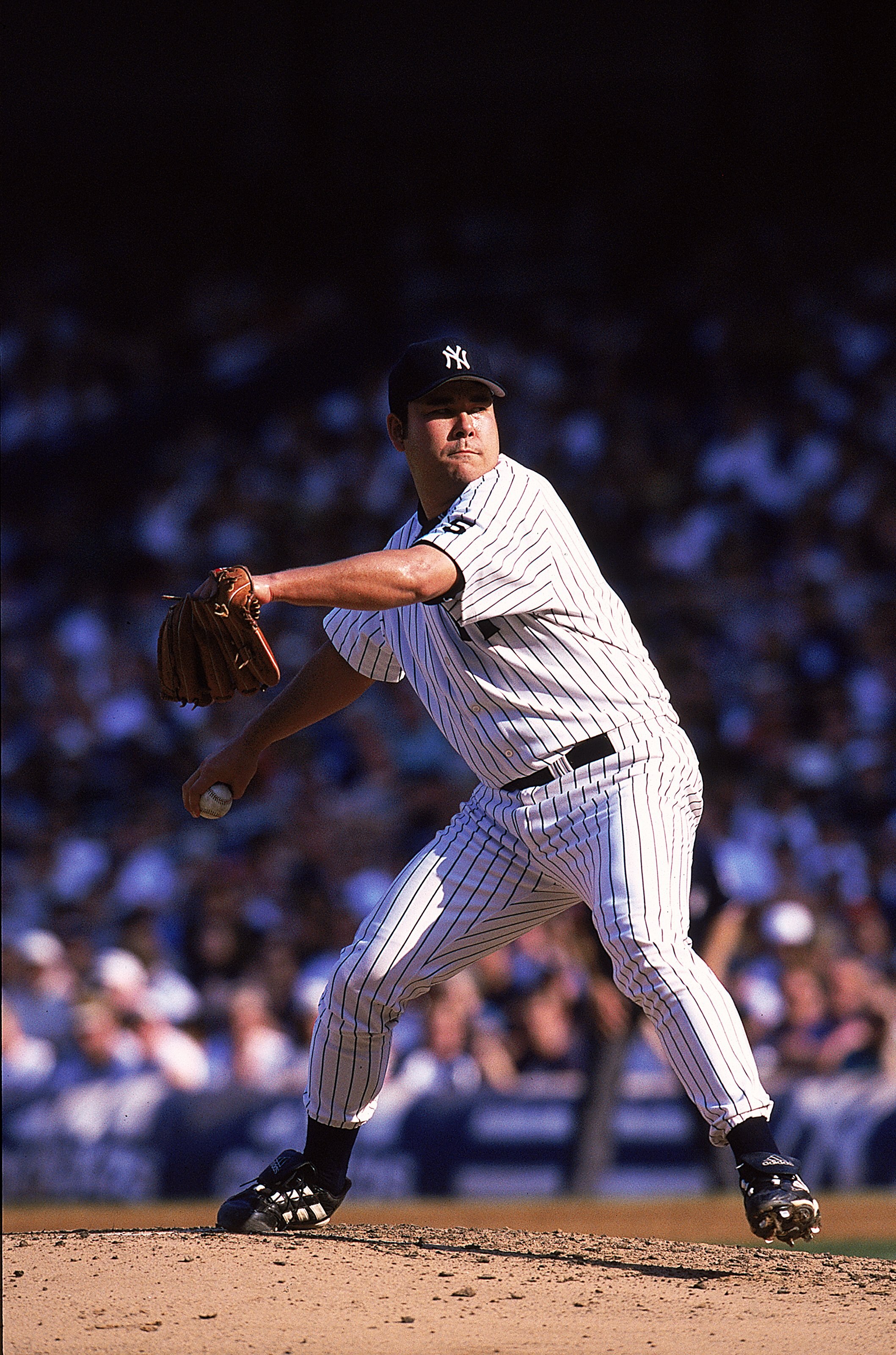 24 Jul 1999: Pitcher Hideki Irabu #14 of the New York Yankees winds back to throw the ball during a game against the Cleveland Indians at the Yankee Stadium in Bronx, New York. The Yankees defeated the Indians 21-1. Mandatory Credit: Ezra O. Shaw  /Allspo