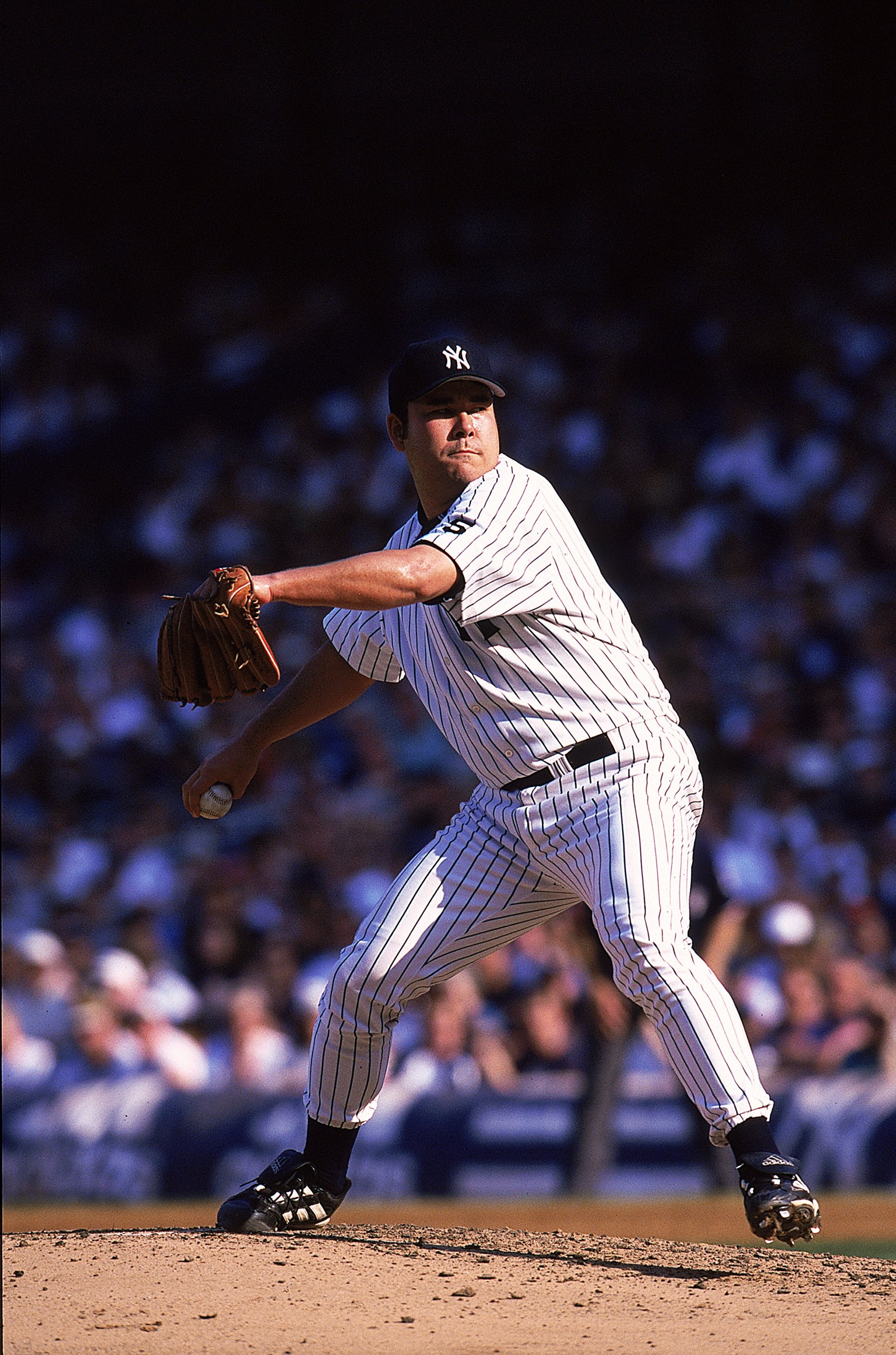 24 Jul 1999: Pitcher Hideki Irabu #14 of the New York Yankees winds back to throw the ball during a game against the Cleveland Indians at the Yankee Stadium in Bronx, New York. The Yankees defeated the Indians 21-1. Mandatory Credit: Ezra O. Shaw  /Allspo