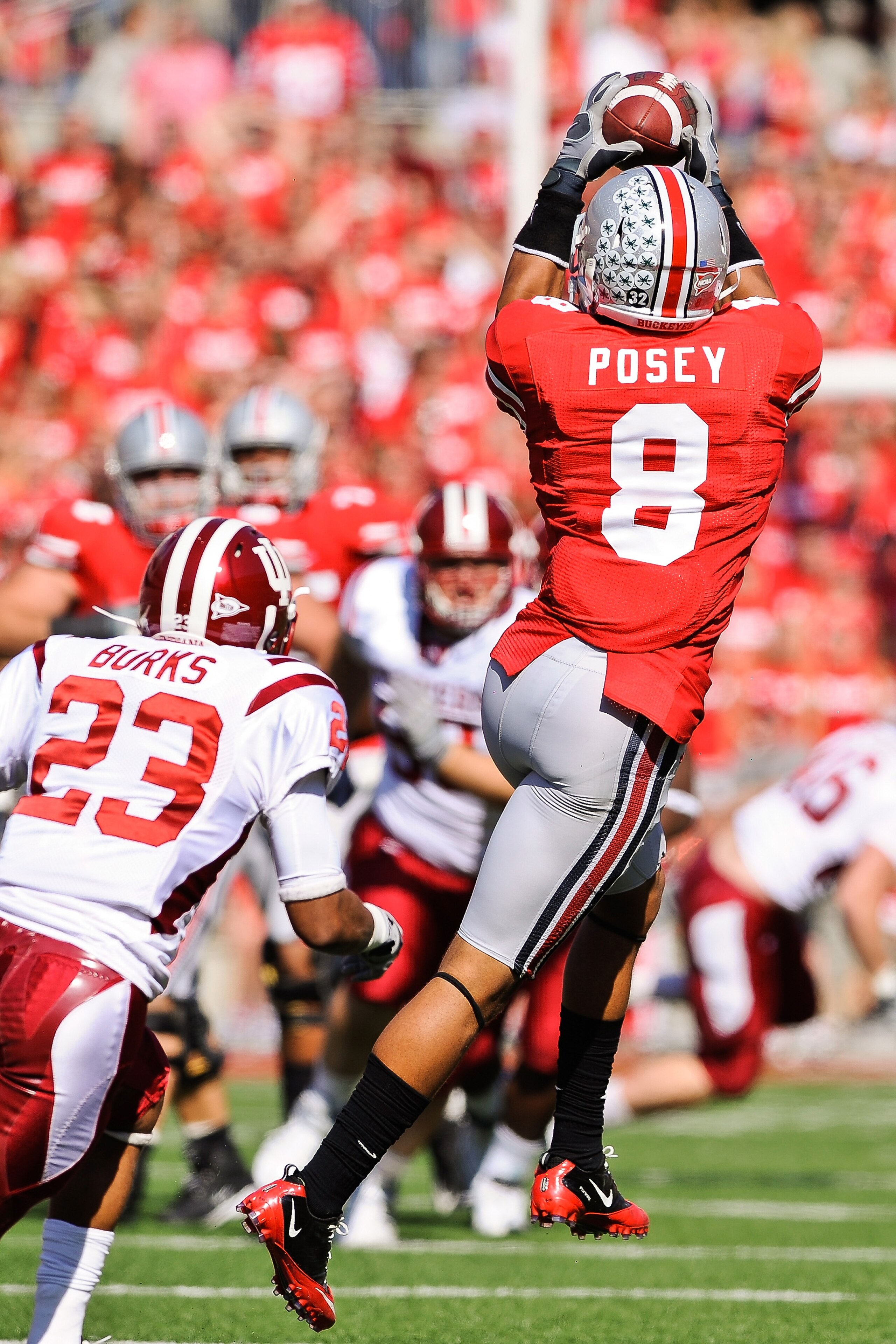 COLUMBUS, OH - OCTOBER 9:  DeVier Posey #8 of the Ohio State Buckeyes catches a pass against the Indiana Hoosiers at Ohio Stadium on October 9, 2010 in Columbus, Ohio.  (Photo by Jamie Sabau/Getty Images)