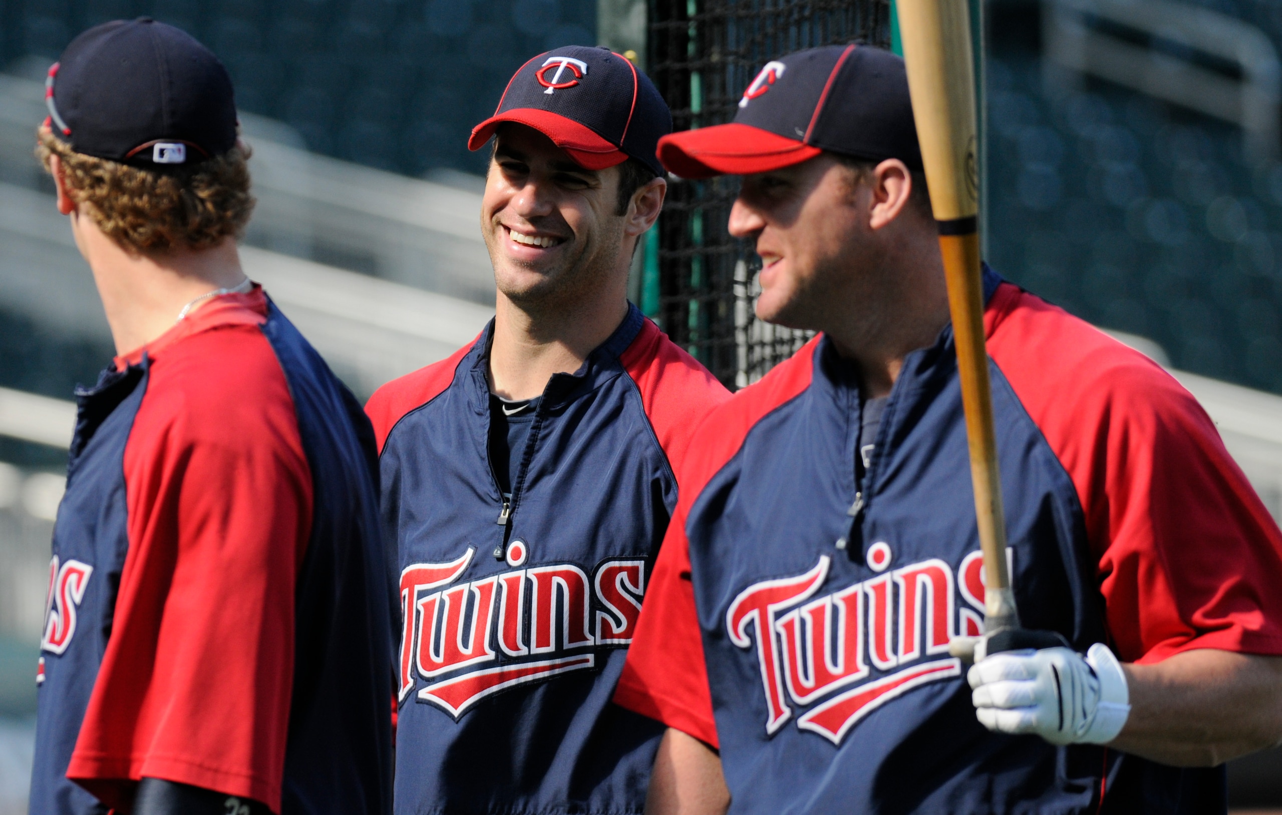 MINNEAPOLIS, MN - JUNE 28: (L-R) Justin Morneau #33, Joe Mauer #7 and Jim Thome #25 of the Minnesota Twins talk during batting practice prior to their game against the Detroit Tigers on June 28, 2010 at Target Field in Minneapolis, Minnesota. Tigers won MINNEAPOLIS, MN - JUNE 28: (L-R) Justin Morneau #33, Joe Mauer #7 and Jim Thome #25 of the Minnesota Twins talk during batting practice prior to their game against the Detroit Tigers on June 28, 2010 at Target Field in Minneapolis, Minnesota. Tigers won