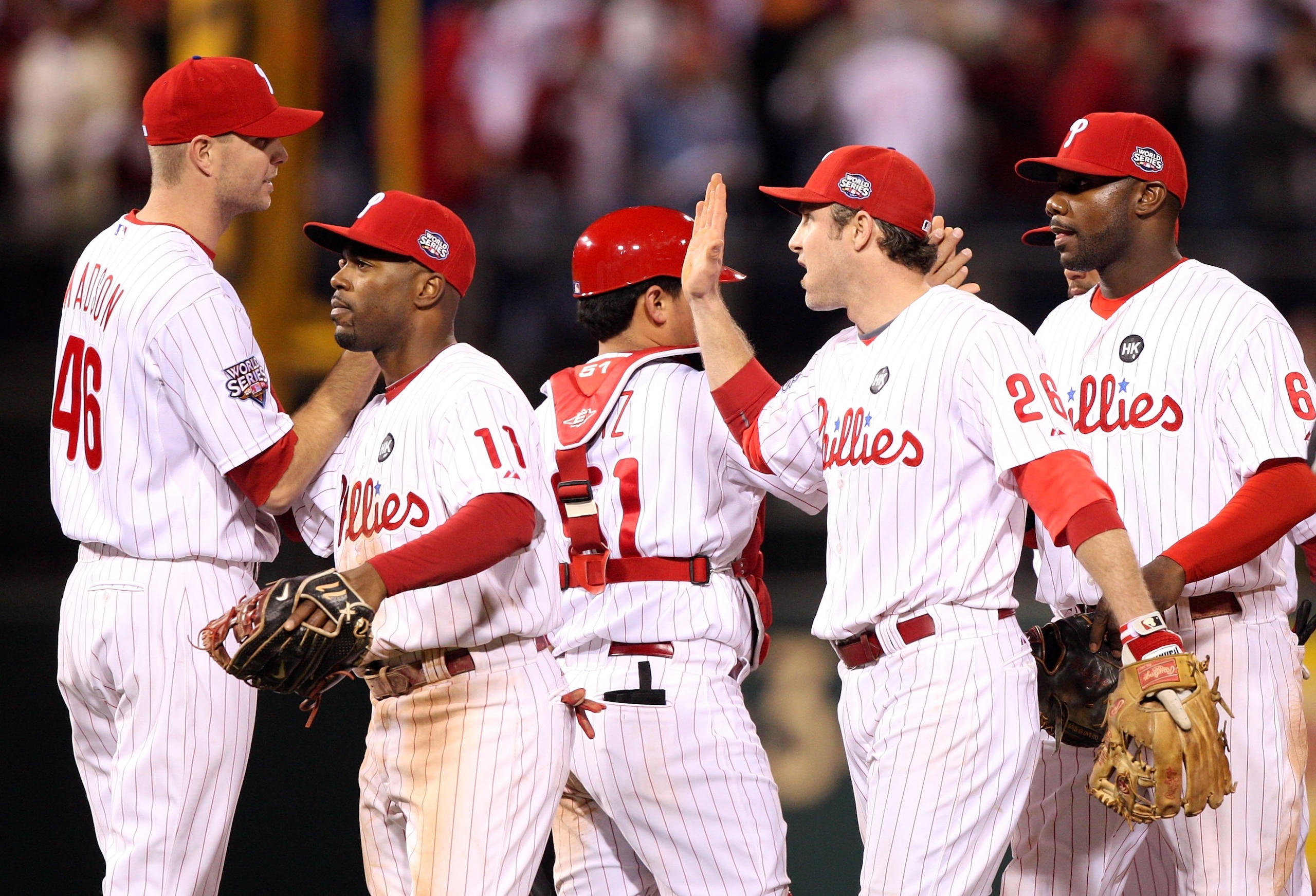 PHILADELPHIA - NOVEMBER 02: (L-R) Ryan Madson #46 of the Philadelphia Phillies is congratulated by Jimmy Rollins #11, Chase Utley #26 and Ryan Howard #6 after their 8-6 win against the New York Yankees in Game Five of the 2009 MLB World Series at Citizen PHILADELPHIA - NOVEMBER 02: (L-R) Ryan Madson #46 of the Philadelphia Phillies is congratulated by Jimmy Rollins #11, Chase Utley #26 and Ryan Howard #6 after their 8-6 win against the New York Yankees in Game Five of the 2009 MLB World Series at Citizen