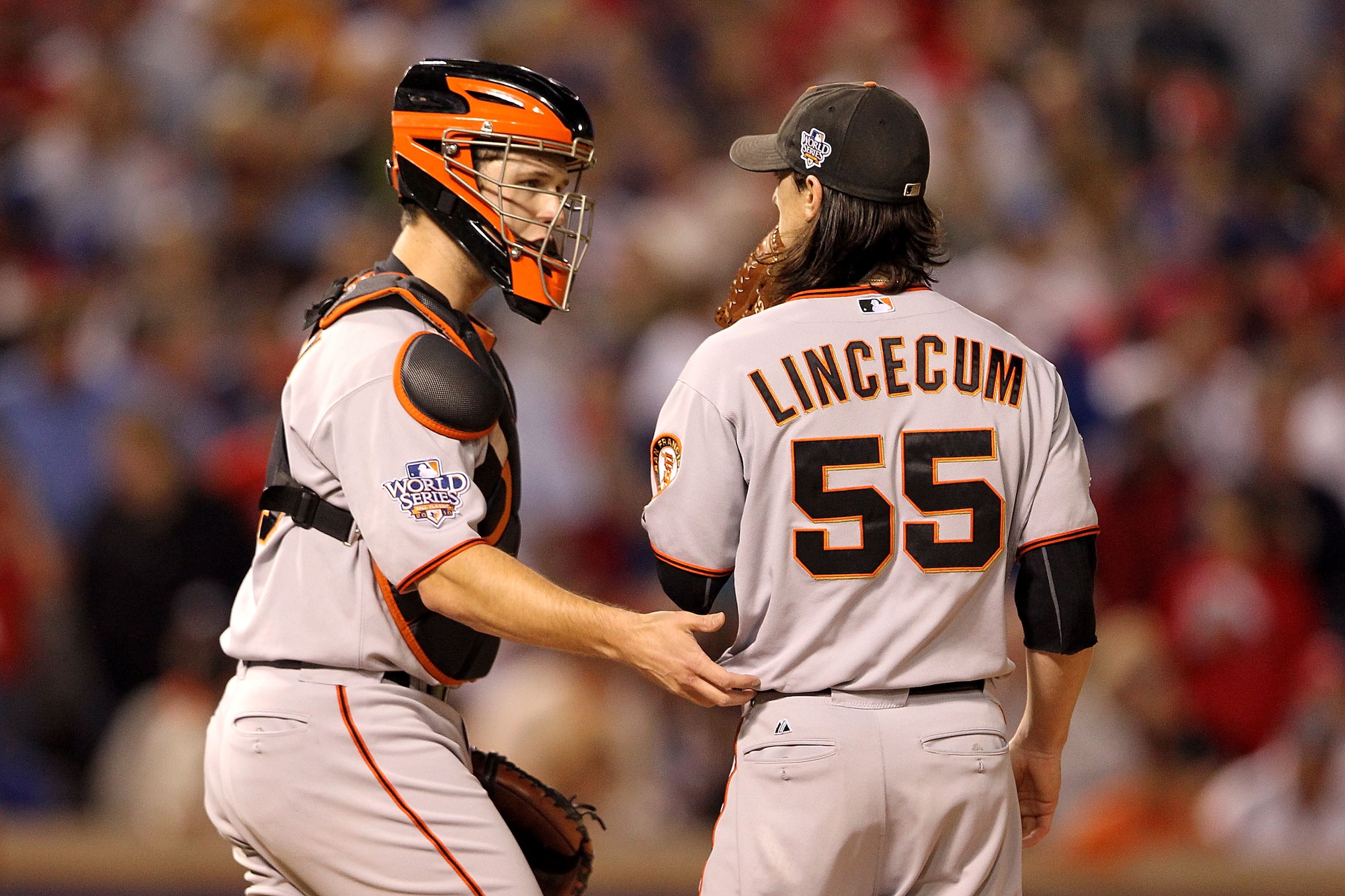 ARLINGTON, TX - NOVEMBER 01: (L-R) Catcher Buster Posey #28 of the San Francisco Giants talks with Tim Lincecum #55 against the Texas Rangers in Game Five of the 2010 MLB World Series at Rangers Ballpark in Arlington on November 1, 2010 in Arlington, Tex ARLINGTON, TX - NOVEMBER 01: (L-R) Catcher Buster Posey #28 of the San Francisco Giants talks with Tim Lincecum #55 against the Texas Rangers in Game Five of the 2010 MLB World Series at Rangers Ballpark in Arlington on November 1, 2010 in Arlington, Tex