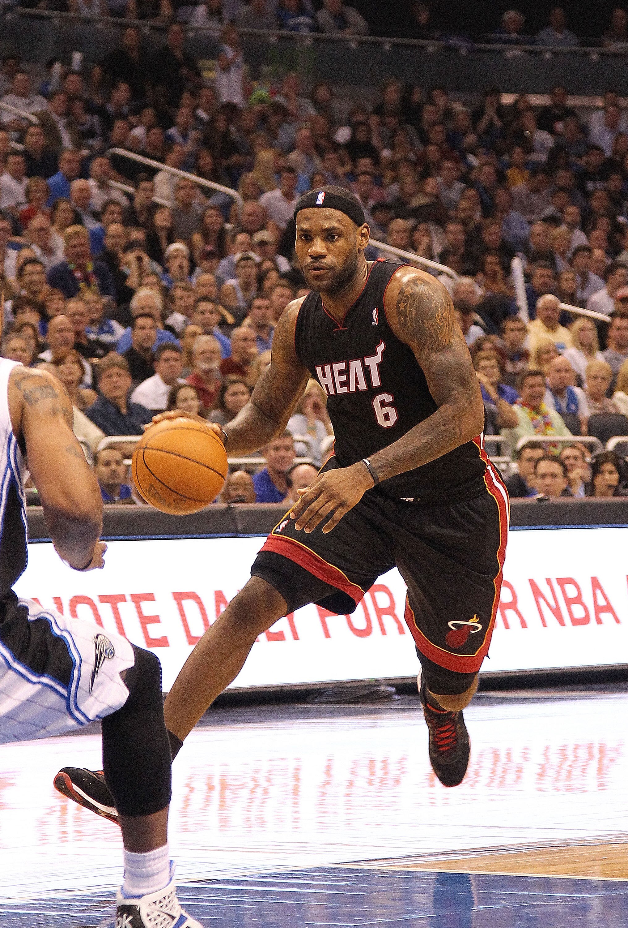 ORLANDO, FL - NOVEMBER 24:  LeBron James #6 of the Miami Heat dribbles  into the lane during a game against the Orlando Magic at Amway Arena on November 24, 2010 in Orlando, Florida. NOTE TO USER: User expressly acknowledges and agrees that, by downloadin