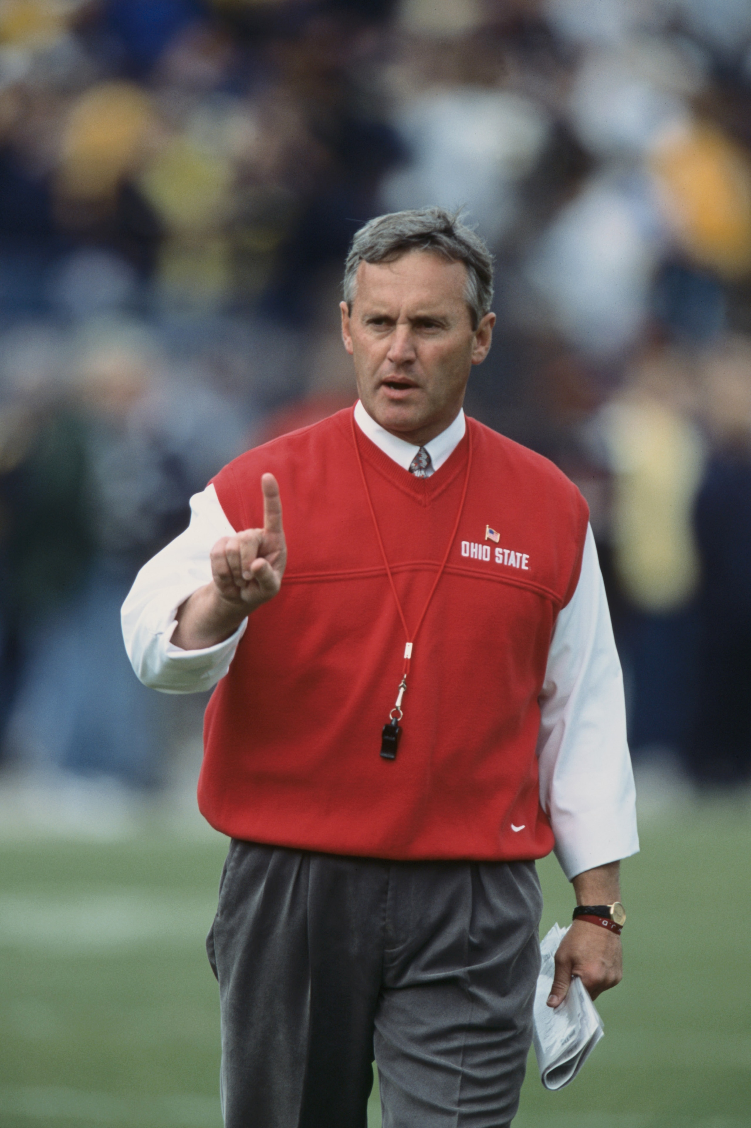 26 Nov 2001: Head Coach Jim Tressel of the Ohio State Buckeyes walks on the field during the game against the Michigan Wolverines at Michigan Stadium in Ann Arbor, Michigan. The Buckeyes defeated the Wolverines 26-20.Mandatory Credit: Danny Moloshok/Allsp