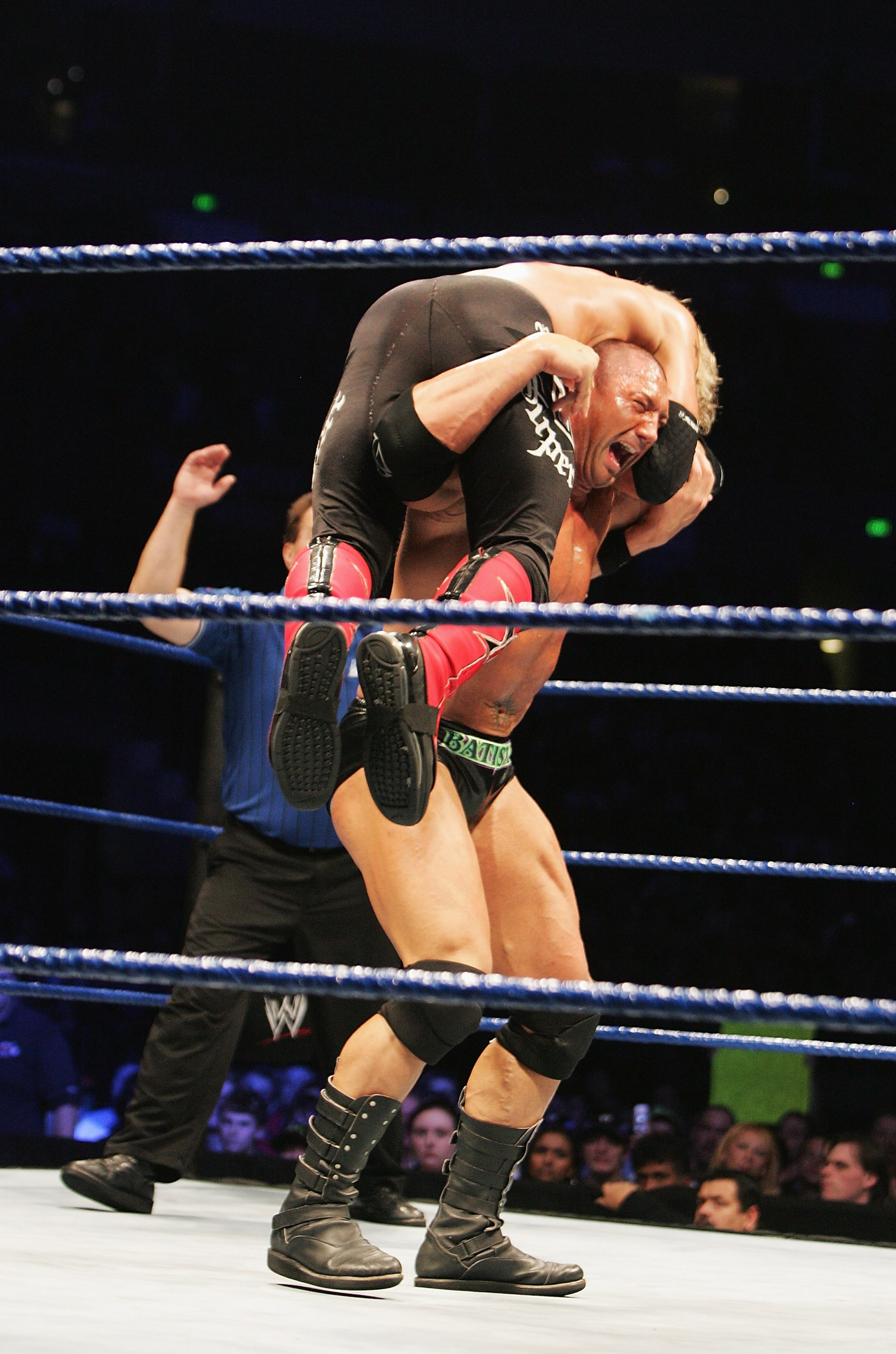 SYDNEY, AUSTRALIA - JUNE 15:  Batista lifts World Heavyweight Champion Edge during WWE Smackdown at Acer Arena on June 15, 2008 in Sydney, Australia.  (Photo by Gaye Gerard/Getty Images)