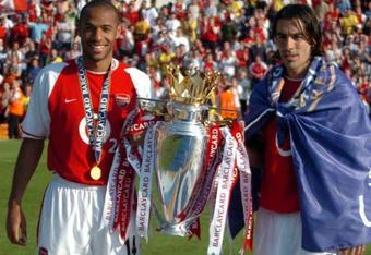 Premier League winner Pires (right)