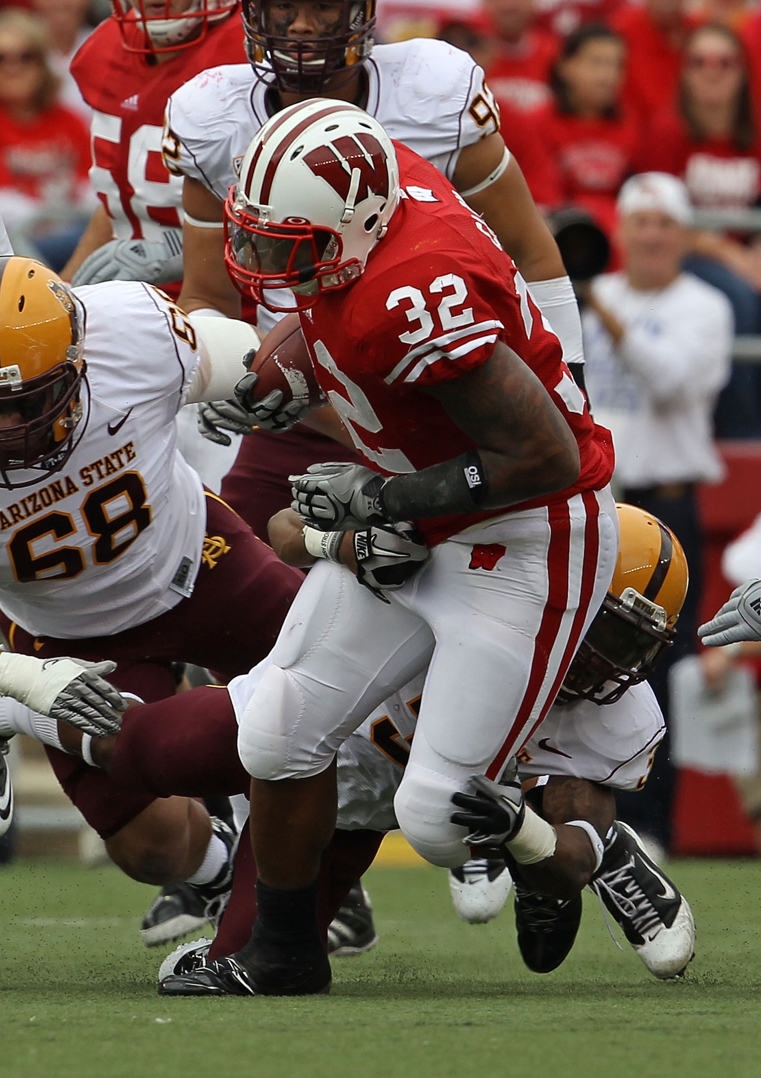 MADISON, WI - SEPTEMBER 18: John Clay #32 of the Wisconsin Badgers runs against the Arizona State Sun Devils at Camp Randall Stadium on September 18, 2010 in Madison, Wisconsin. Wisconsin defeated Arizona State 20-19. (Photo by Jonathan Daniel/Getty Image MADISON, WI - SEPTEMBER 18: John Clay #32 of the Wisconsin Badgers runs against the Arizona State Sun Devils at Camp Randall Stadium on September 18, 2010 in Madison, Wisconsin. Wisconsin defeated Arizona State 20-19. (Photo by Jonathan Daniel/Getty Image