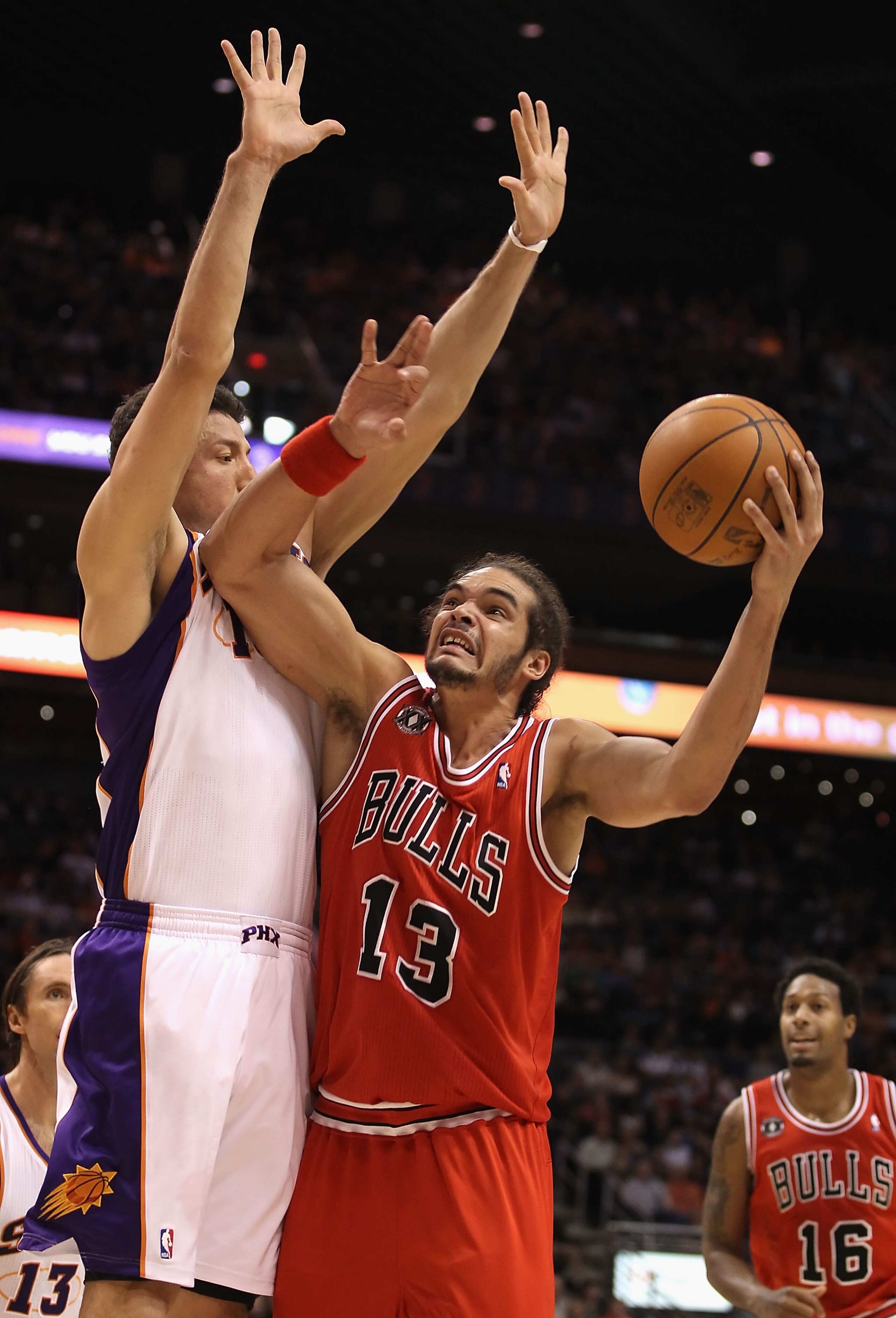 PHOENIX - NOVEMBER 24:  Joakim Noah #13 of the Chicago Bulls puts up a shot against the Phoenix Suns during the NBA game at US Airways Center on November 24, 2010 in Phoenix, Arizona. The Bulls defeated the Suns 123-115 in double overtime. NOTE TO USER: U