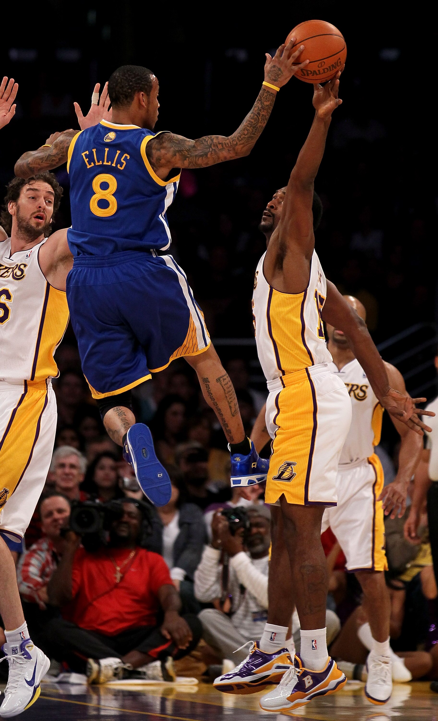 LOS ANGELES - NOVEMBER 21:  Ron Artest #15 of the Los Angeles Lakers blocks a pass attempt by Monta Ellis #8 of the Golden State Warriors at Staples Center on November 21, 2010 in Los Angeles, California. The Lakers won 117-89. NOTE TO USER: User expressl