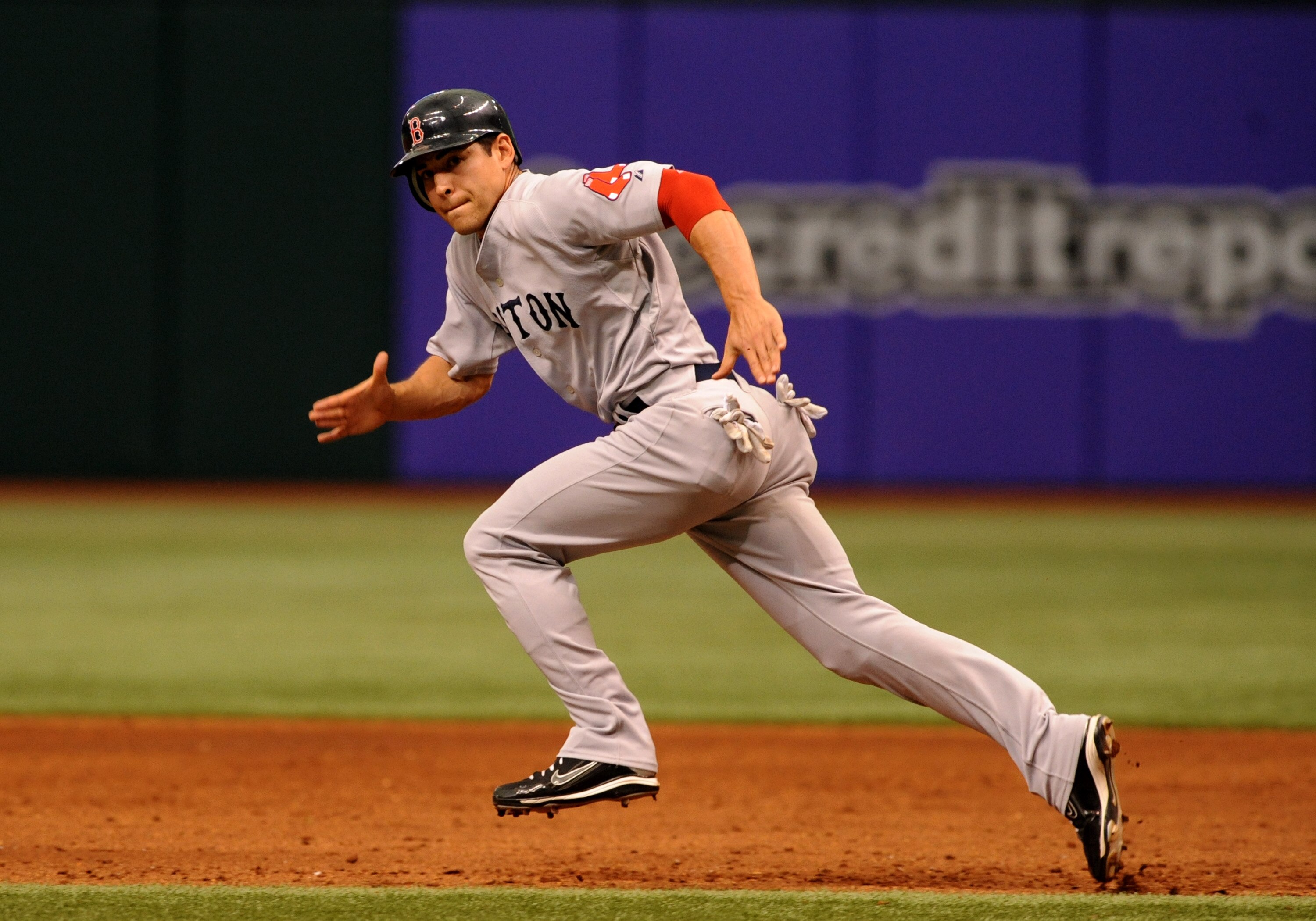 ST. PETERSBURG, FL - MAY 3: Outfielder Jacoby Ellsbury #46 of the Boston Red Sox attempts a steal against the Tampa Bay Rays May 3, 2009 at Tropicana Field in St. Petersburg, Florida. (Photo by Al Messerschmidt/Getty Images)