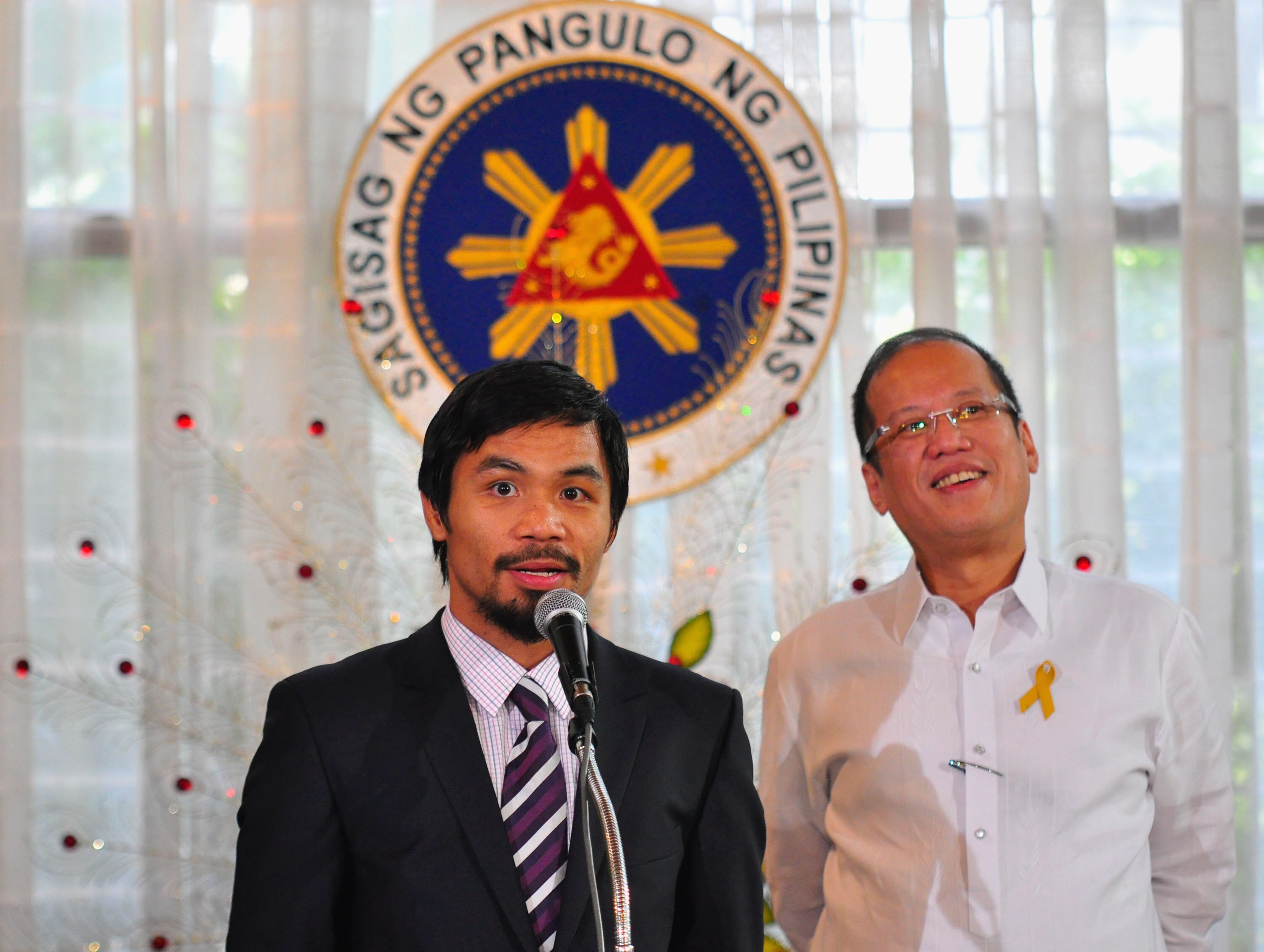 MANILA, PHILIPPINES - NOVEMBER 20:  Boxer and congressman, Manny Pacquiao addresses the audience at Malacanang Palace in Manila following his win of the WBC super welterweight crown against Mexican Antonio Margarito on November 20, 2010 in Manila, Philipp