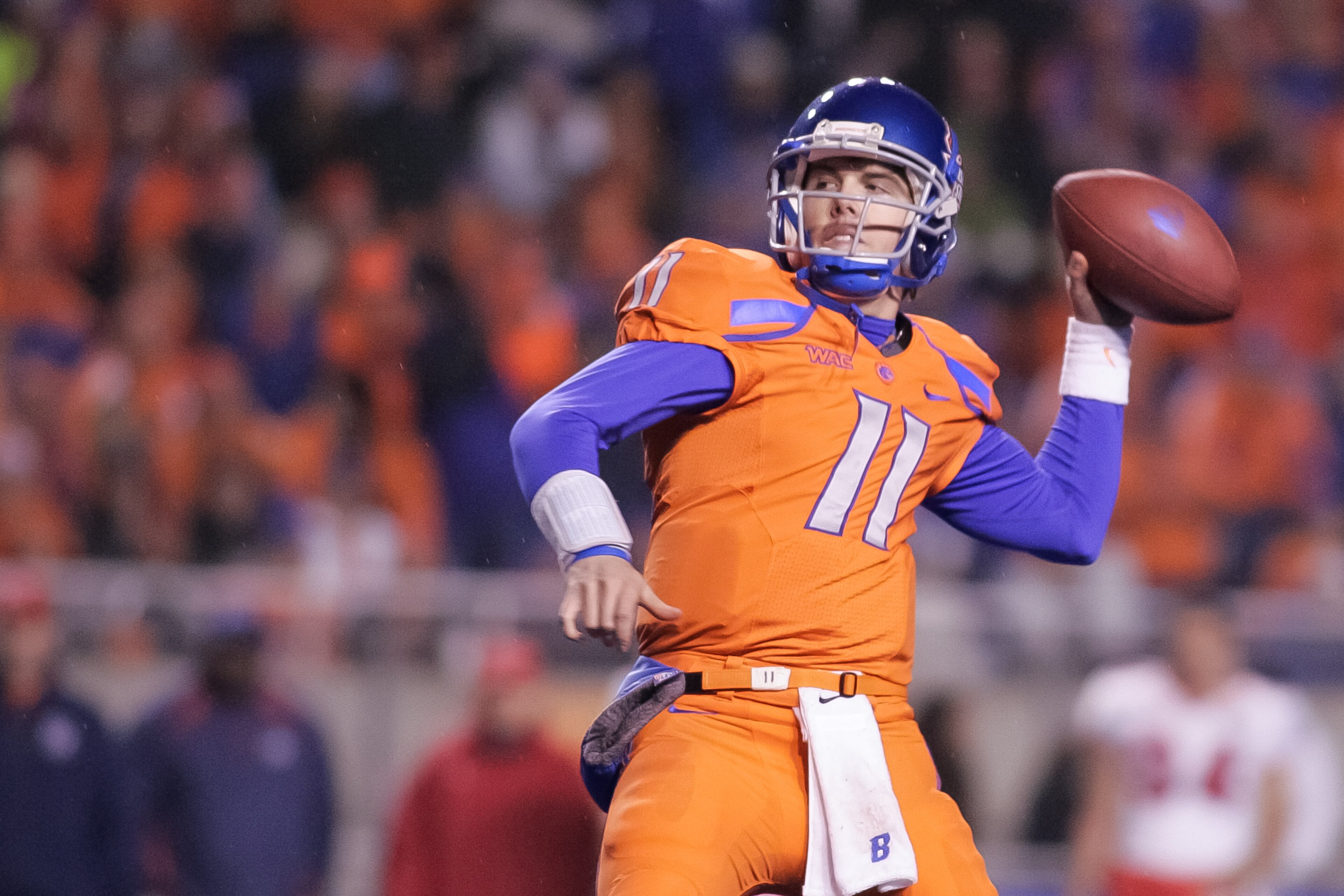 BOISE, ID - NOVEMBER 19: Kellen Moore #11 of the Boise State Broncos passes against the Fresno State Bulldogs at Bronco Stadium on November 19, 2010 in Boise, Idaho. (Photo by Otto Kitsinger III/Getty Images) BOISE, ID - NOVEMBER 19: Kellen Moore #11 of the Boise State Broncos passes against the Fresno State Bulldogs at Bronco Stadium on November 19, 2010 in Boise, Idaho. (Photo by Otto Kitsinger III/Getty Images)