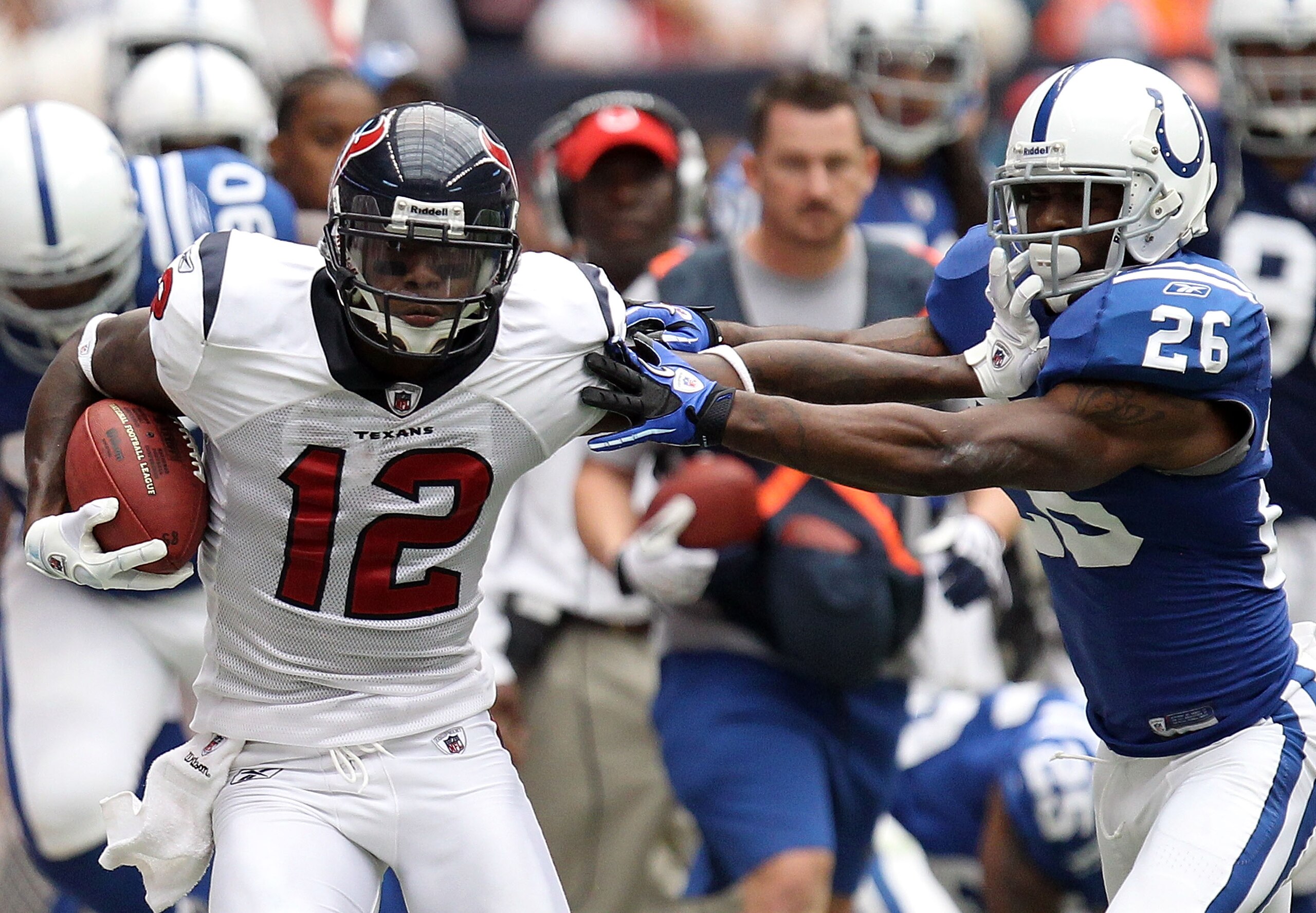 HOUSTON - SEPTEMBER 12: Wide receiver Jacoby Jones #12 of the Houston Texans runs the ball past Kelvin Hayden #26 of the Indianapolis Colts at Reliant Stadium on September 12, 2010 in Houston, Texas. (Photo by Ronald Martinez/Getty Images) HOUSTON - SEPTEMBER 12: Wide receiver Jacoby Jones #12 of the Houston Texans runs the ball past Kelvin Hayden #26 of the Indianapolis Colts at Reliant Stadium on September 12, 2010 in Houston, Texas. (Photo by Ronald Martinez/Getty Images)