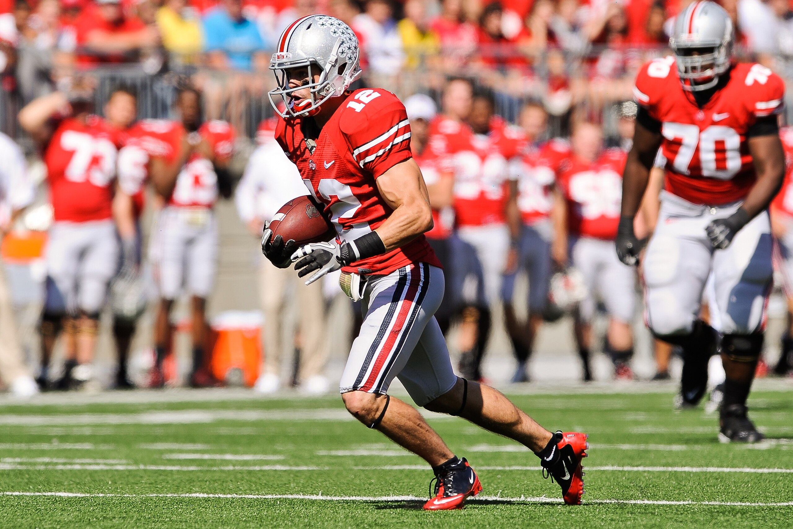 COLUMBUS, OH - OCTOBER 9: Dane Sanzenbacher #12 of the Ohio State Buckeyes runs with the ball against the Indiana Hoosiers at Ohio Stadium on October 9, 2010 in Columbus, Ohio. (Photo by Jamie Sabau/Getty Images) COLUMBUS, OH - OCTOBER 9: Dane Sanzenbacher #12 of the Ohio State Buckeyes runs with the ball against the Indiana Hoosiers at Ohio Stadium on October 9, 2010 in Columbus, Ohio. (Photo by Jamie Sabau/Getty Images)