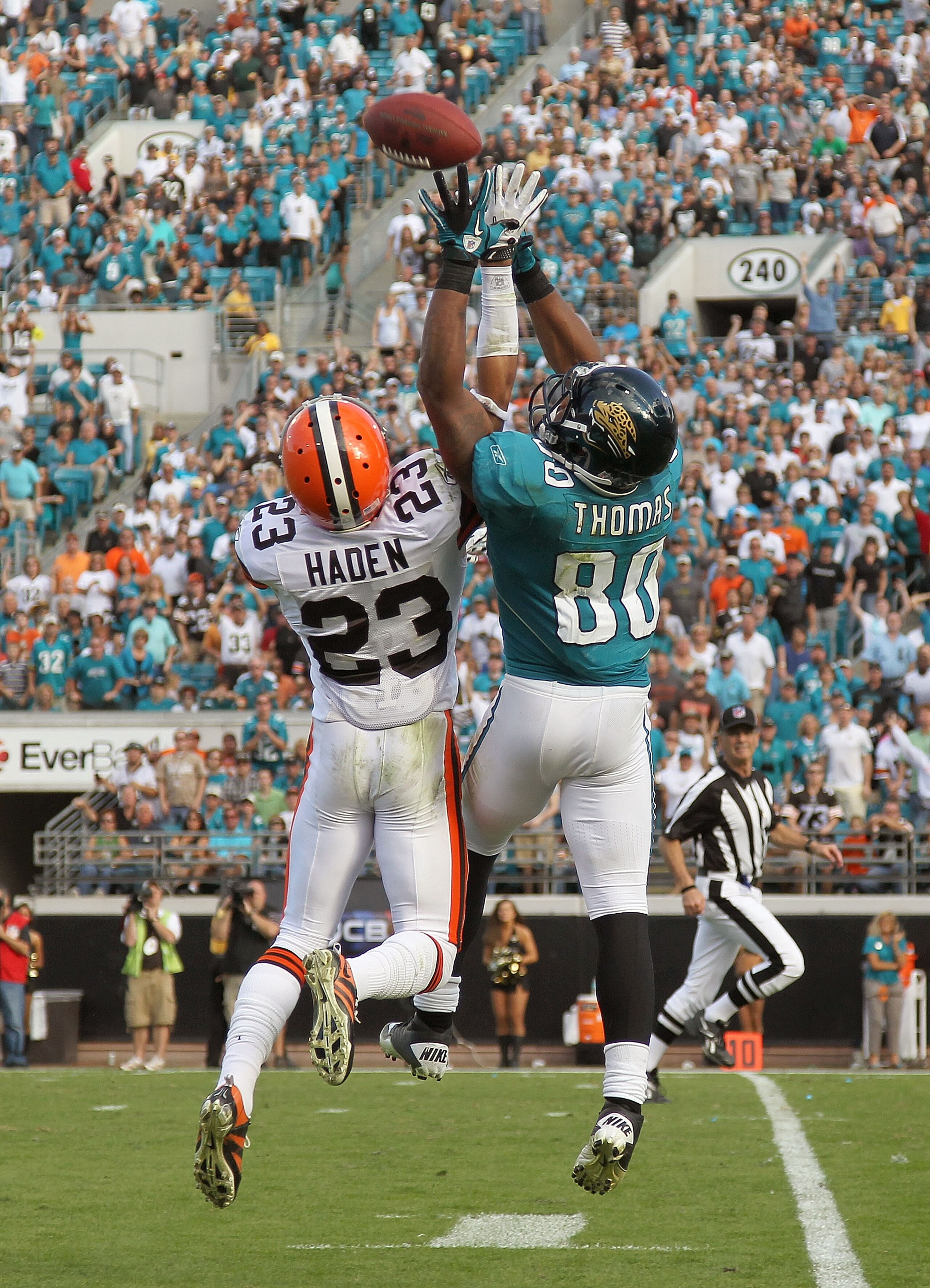 JACKSONVILLE, FL - NOVEMBER 21: Mike Thomas #80 of the Jacksonville Jaguars goes up for a ball against Joe Haden #23 during a game agaisnt the Cleveland Browns at EverBank Field on November 21, 2010 in Jacksonville, Florida.  (Photo by Mike Ehrmann/Getty