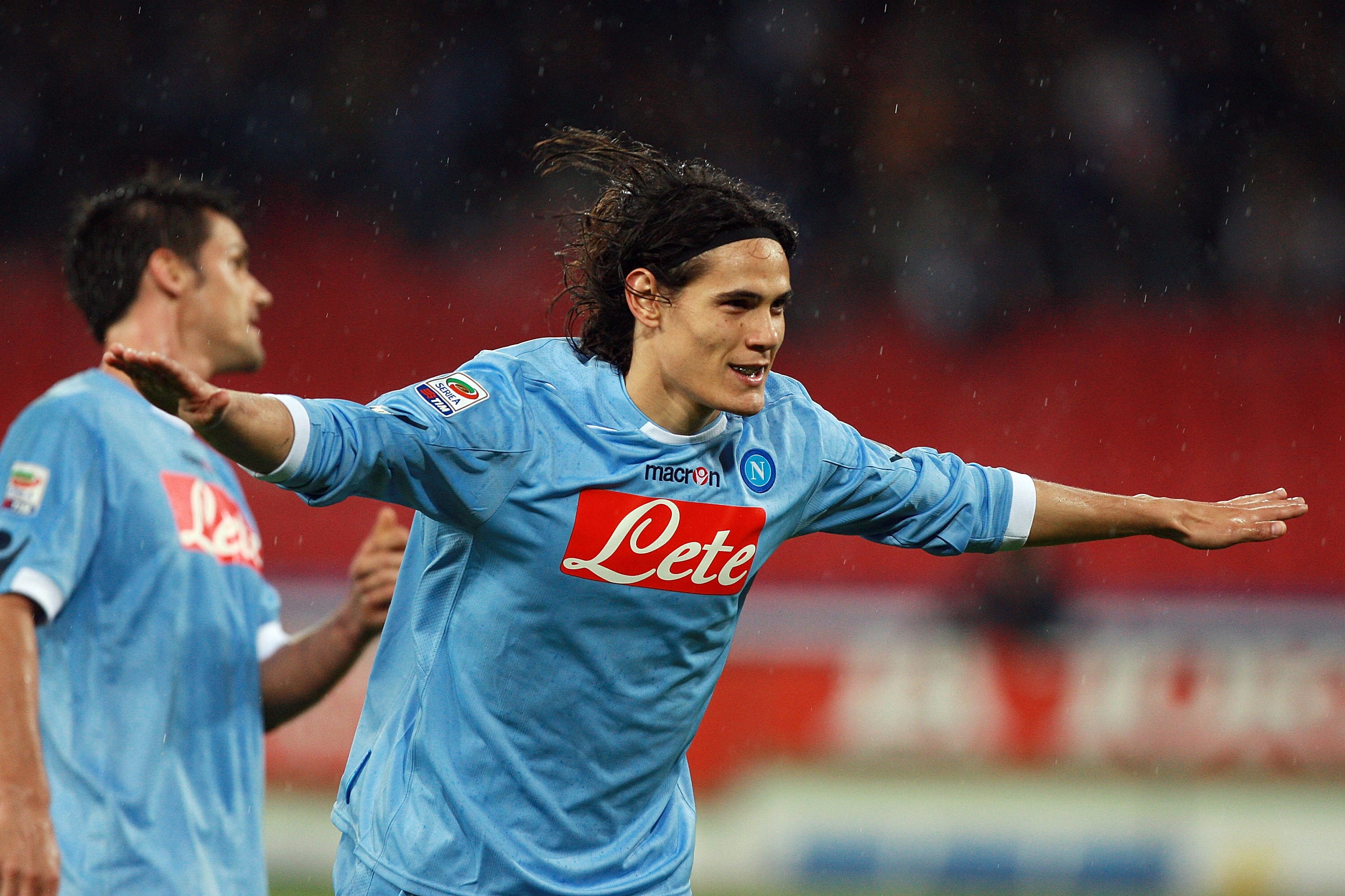 NAPLES, ITALY - NOVEMBER 21:  Edison Cavani of SSC Napoli celebrates after scoring the fourth goal during the Serie A match between SSC Napoli and Bologna FC at Stadio San Paolo on November 21, 2010 in Naples, Italy.  (Photo by Paolo Bruno/Getty Images)