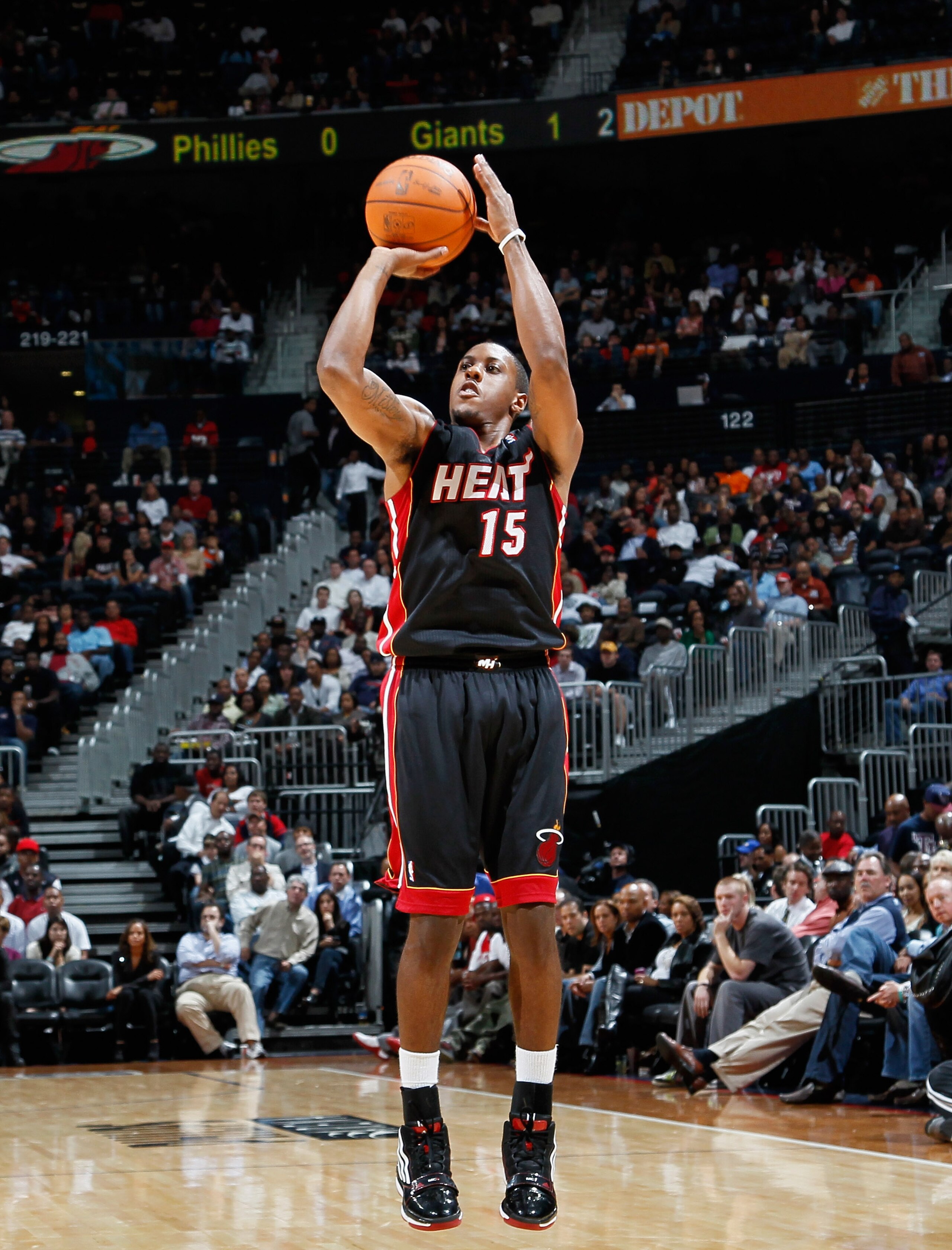 ATLANTA - OCTOBER 21: Mario Chalmers #15 of the Miami Heat against the Atlanta Hawks at Philips Arena on October 21, 2010 in Atlanta, Georgia. (Photo by Kevin C. Cox/Getty Images) ATLANTA - OCTOBER 21: Mario Chalmers #15 of the Miami Heat against the Atlanta Hawks at Philips Arena on October 21, 2010 in Atlanta, Georgia. (Photo by Kevin C. Cox/Getty Images)