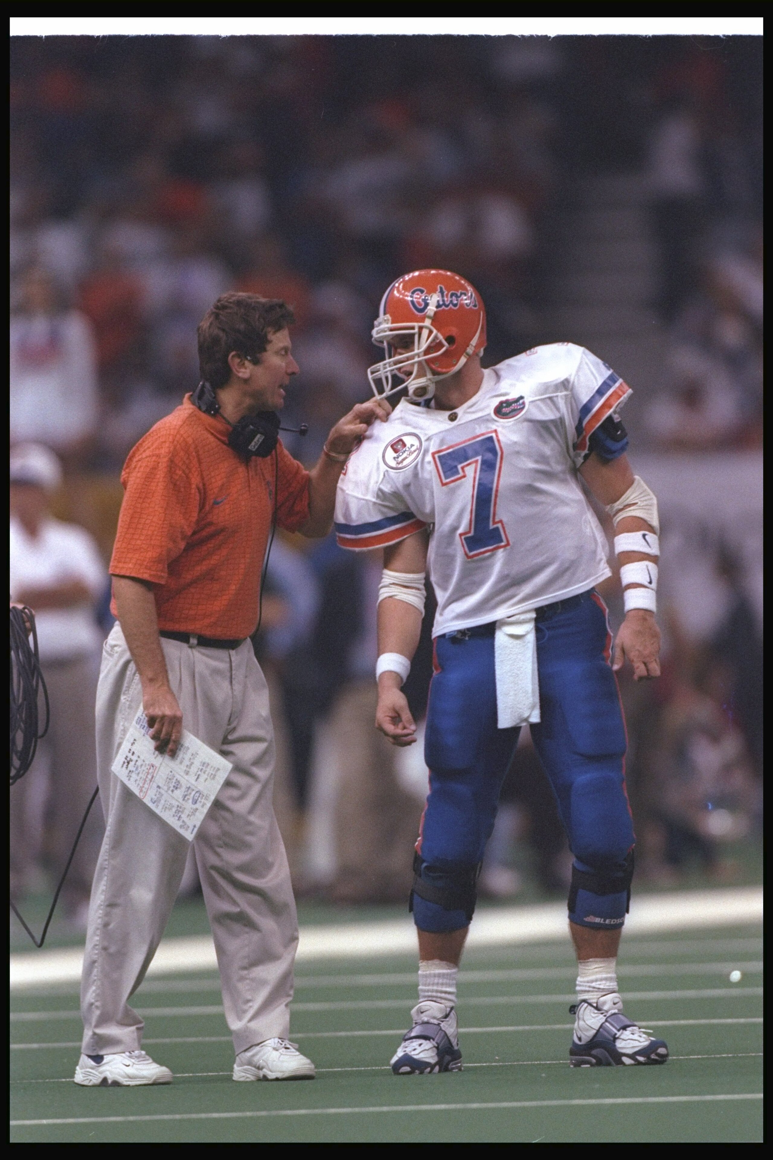 2 Jan 1997: Florida Gators head coach Steve Spurrier confers with quarterback Danny Wuerffel during the Nokia Sugar Bowl against the Florida State Seminoles at the Superdome in New Orleans, Louisiana. Florida won the game, 52-20.