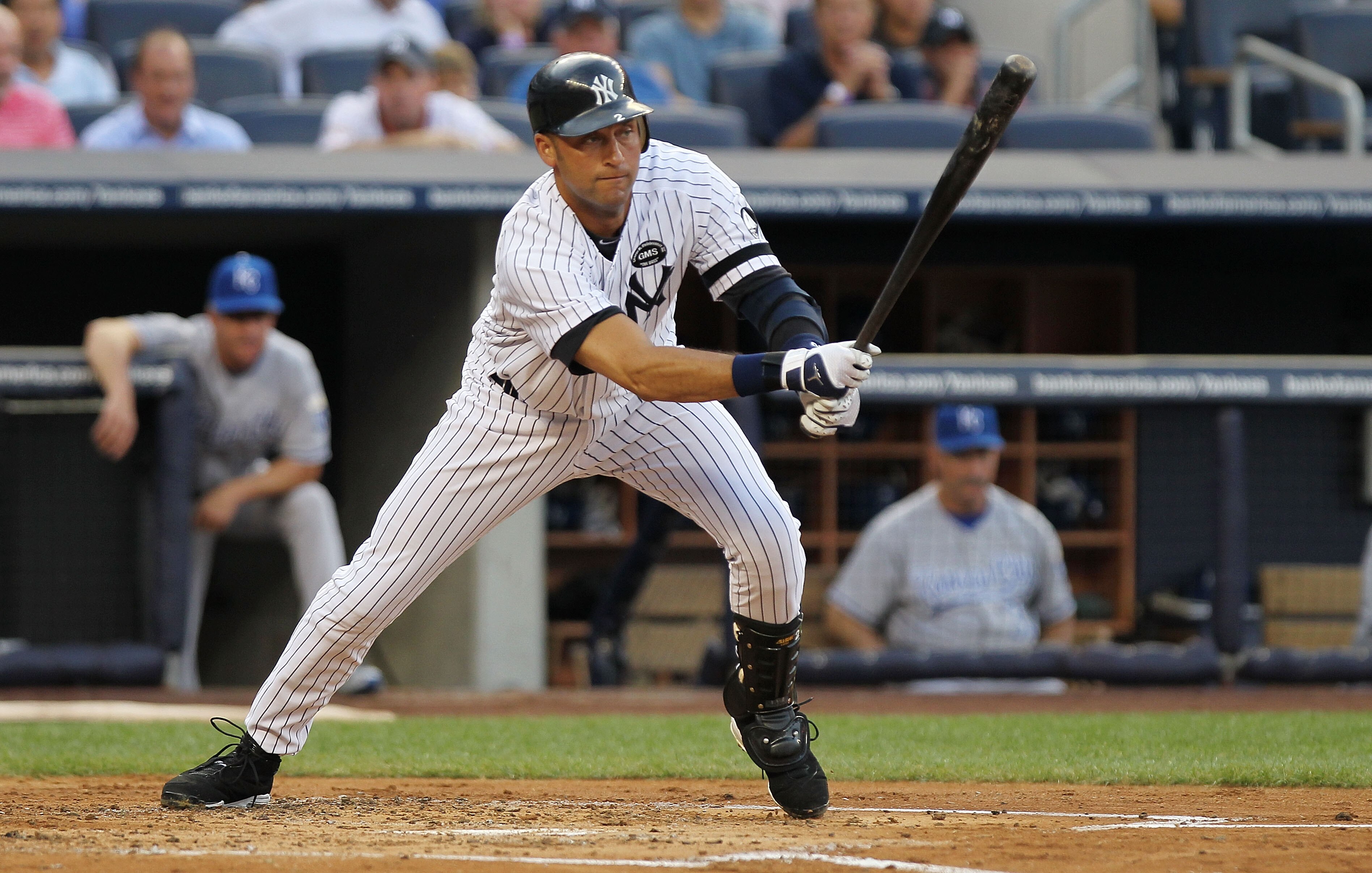 NEW YORK - JULY 22:  Derek Jeter #2 of the New York Yankees hits a single in the second against the Kansas City Royals at Yankee Stadium on July 22, 2010 in the Bronx borough of New York City.  (Photo by Nick Laham/Getty Images)