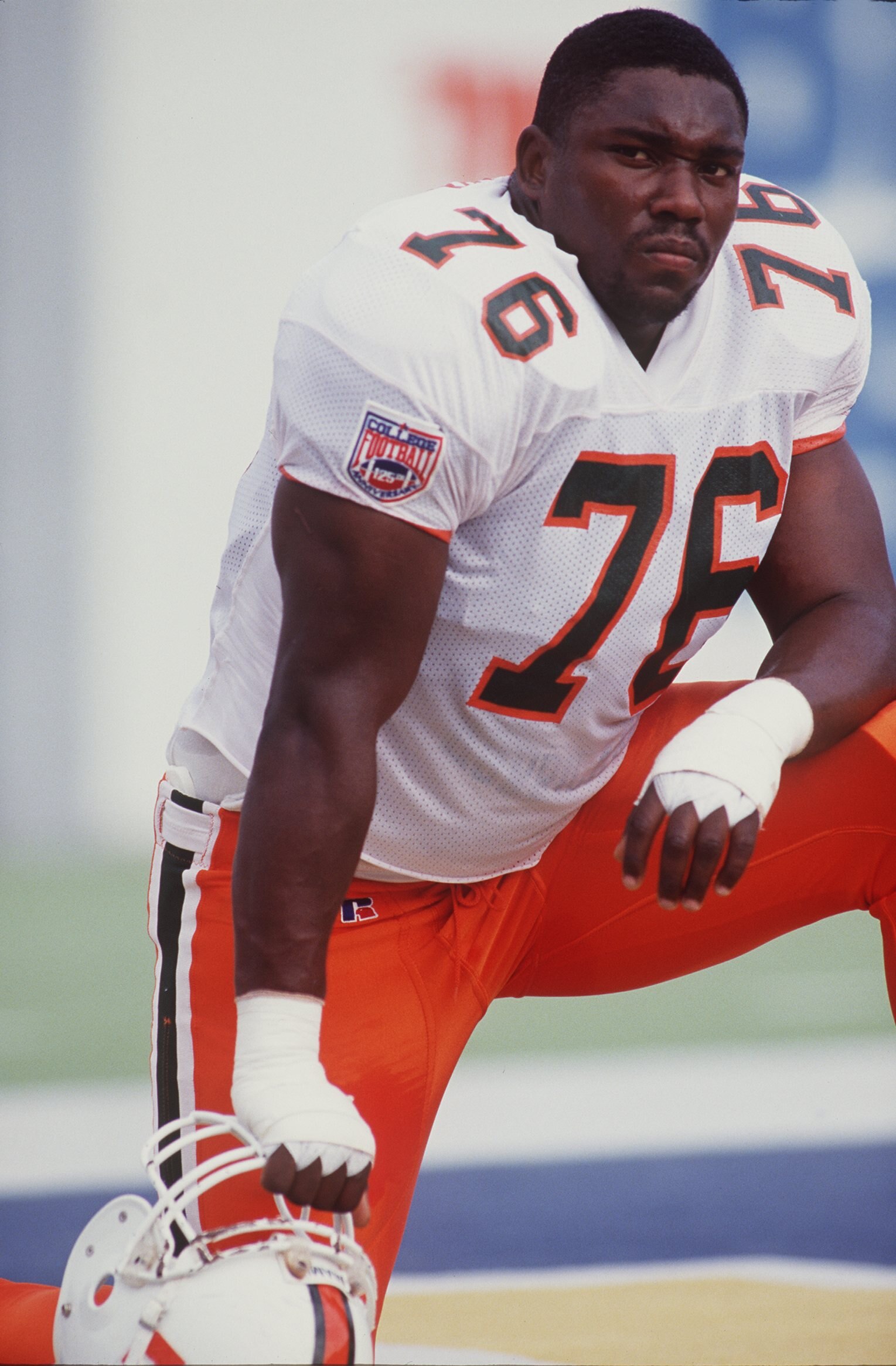 22 OCT 1994:  DEFENSIVE TACKLE WARREN SAPP OF THE MIAMI HURRICANES ON THE SIDELINES DURING THE 38-6 WIN OVER WEST VIRGINIA AT MOUNTAINEER FIELD IN MORGANSTOWN, WEST VIRGINIA. Mandatory Credit: Jed Jacobson/ALLSPORT